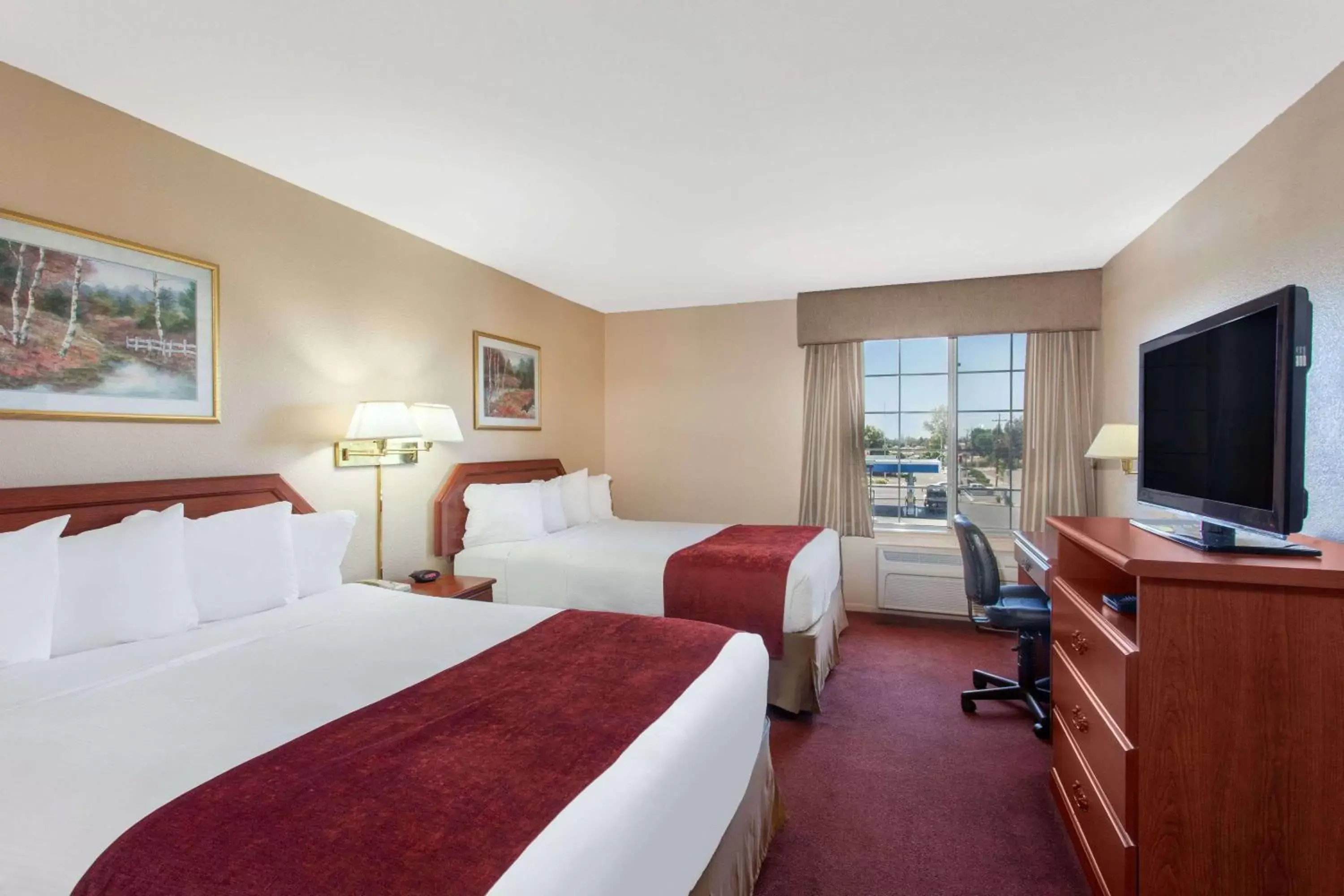 Photo of the whole room, Bed in Ramada by Wyndham Fresno Northwest