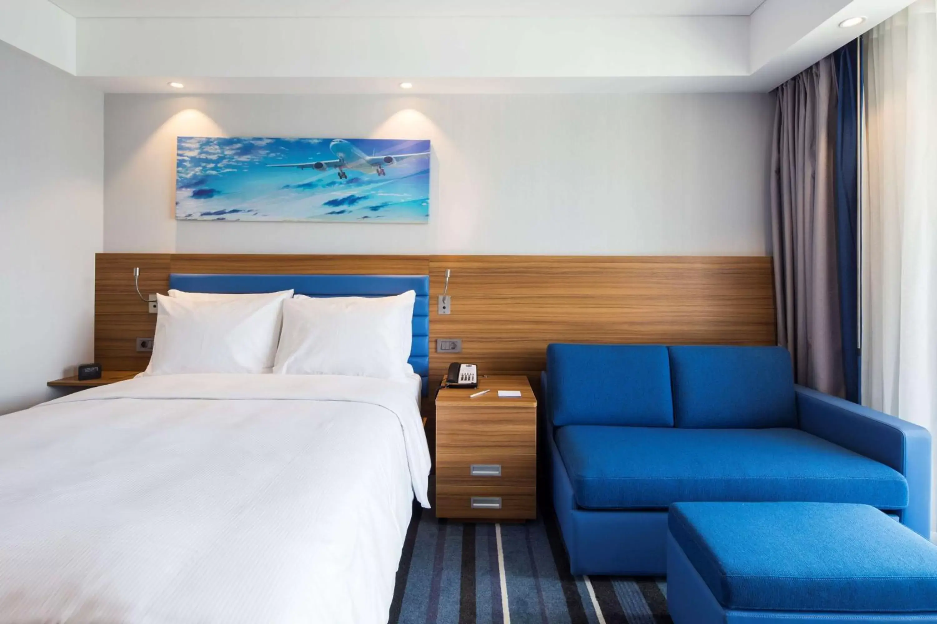 Living room, Bed in Hampton by Hilton Istanbul Kurtkoy