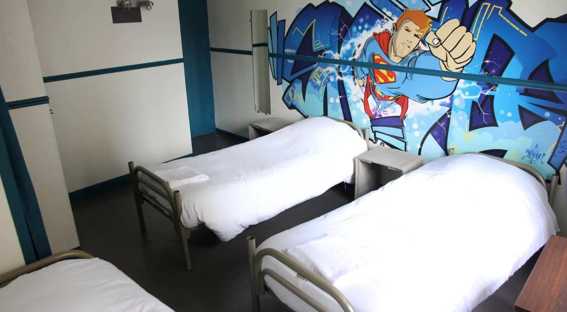 Bed in Absolute Hotel Paris République