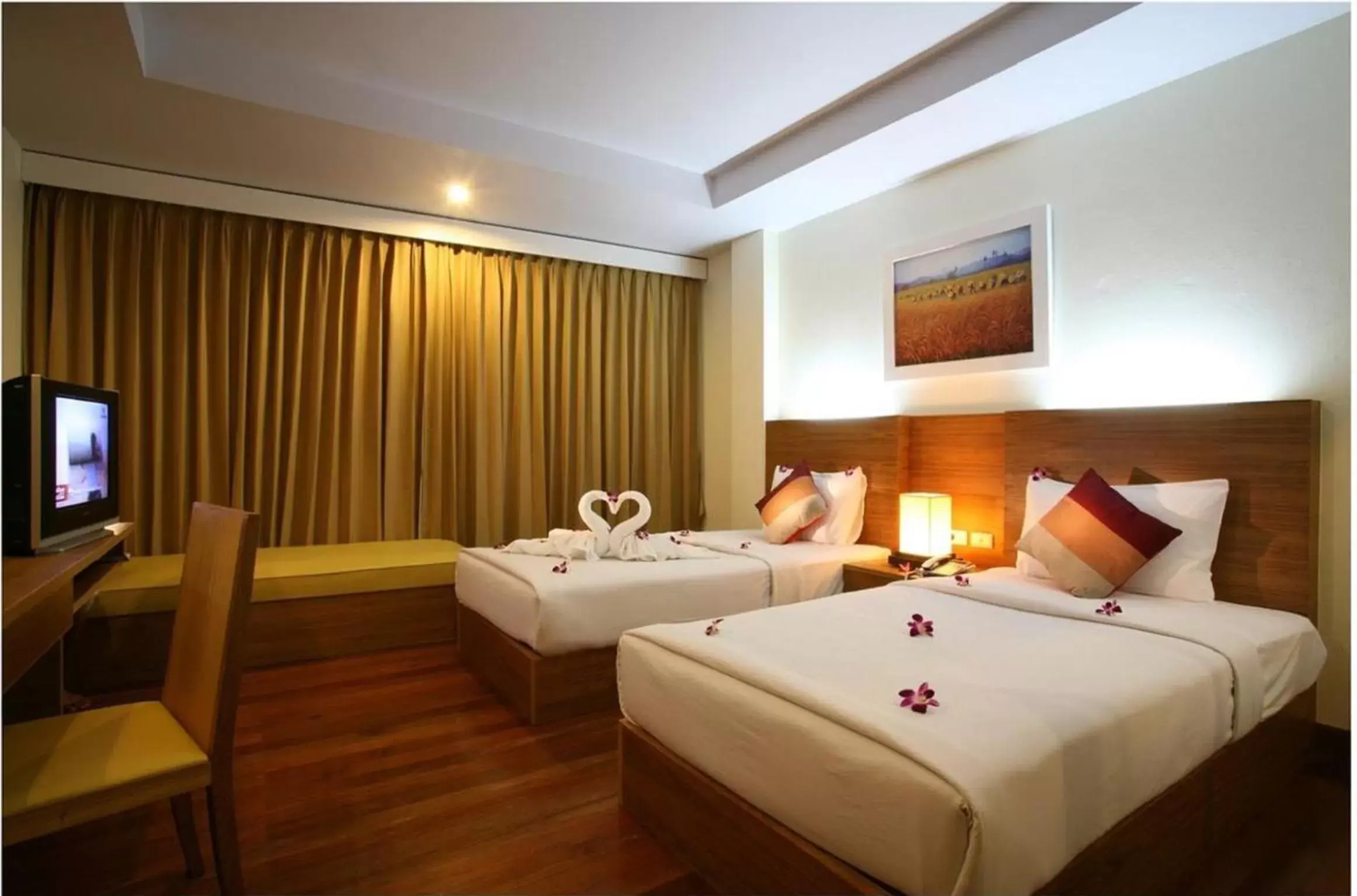 Bed in Baan Saikao Plaza Hotel & Service Apartment