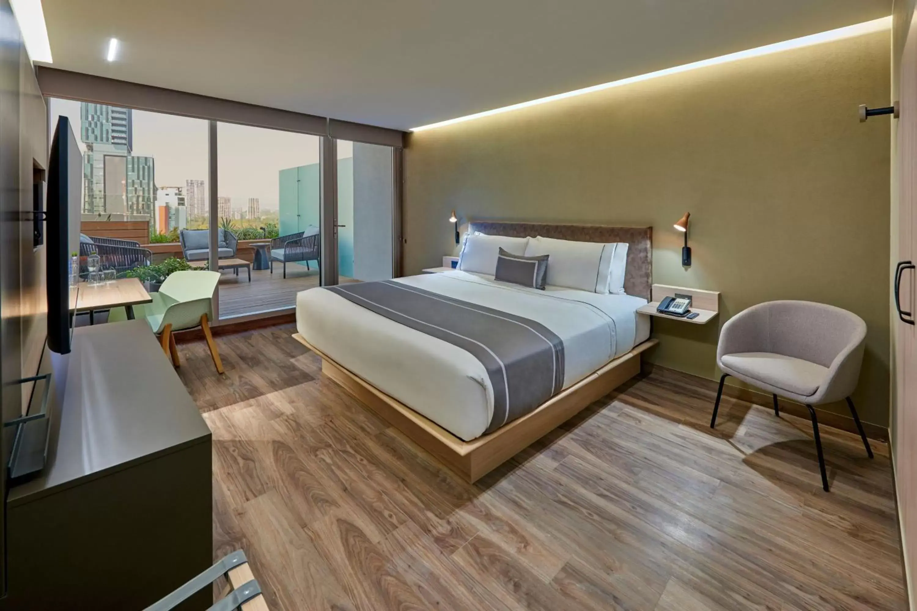 Photo of the whole room, Bed in City Express Plus by Marriott Guadalajara Providencia