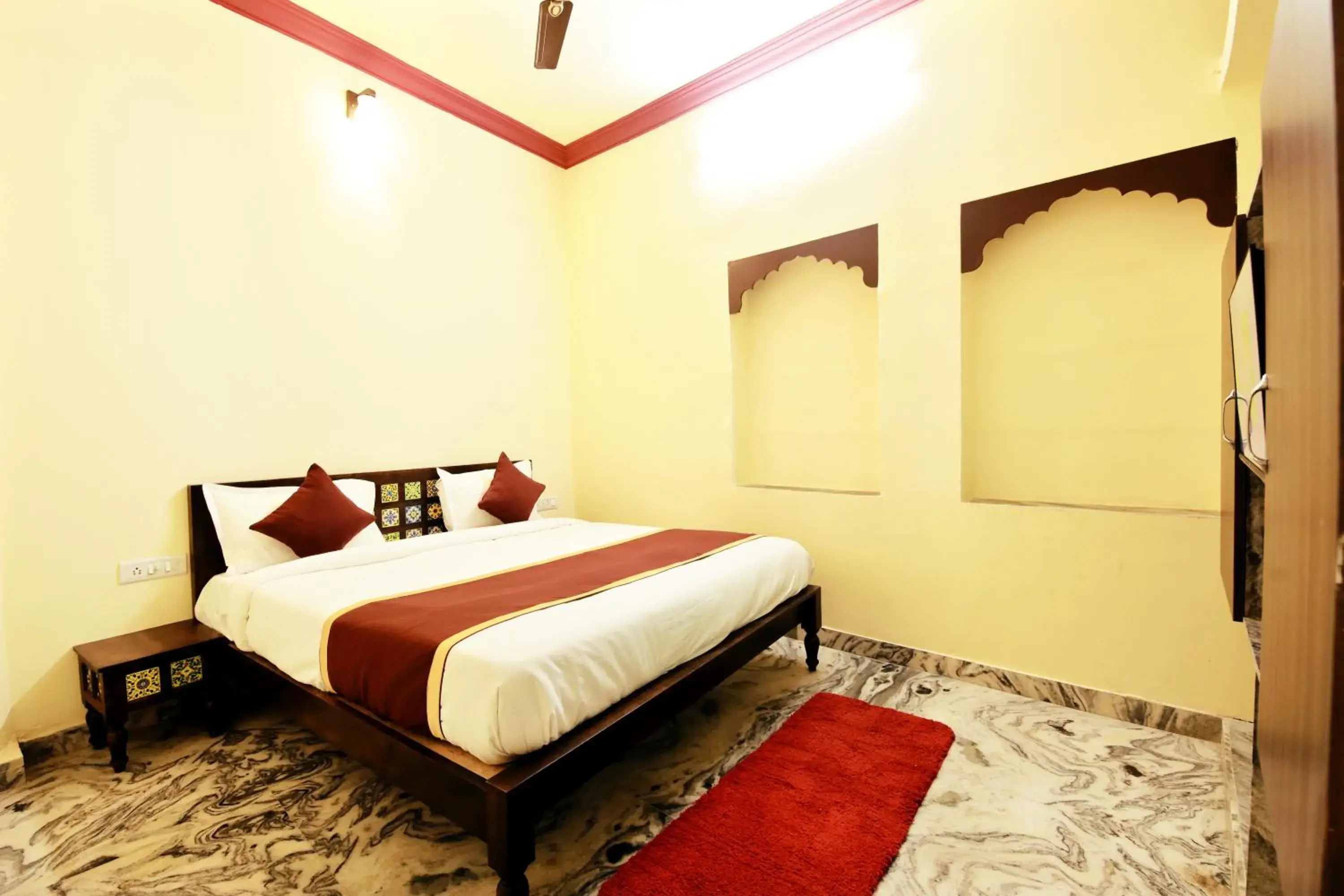 Bed in The Kanchangarh Resort