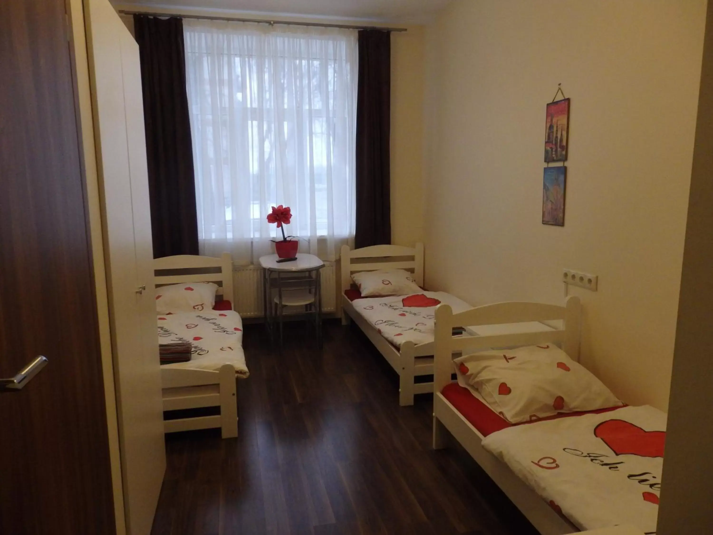 Triple Room with Shower in Happy Hotel Triple Room with Shower in Happy Hotel