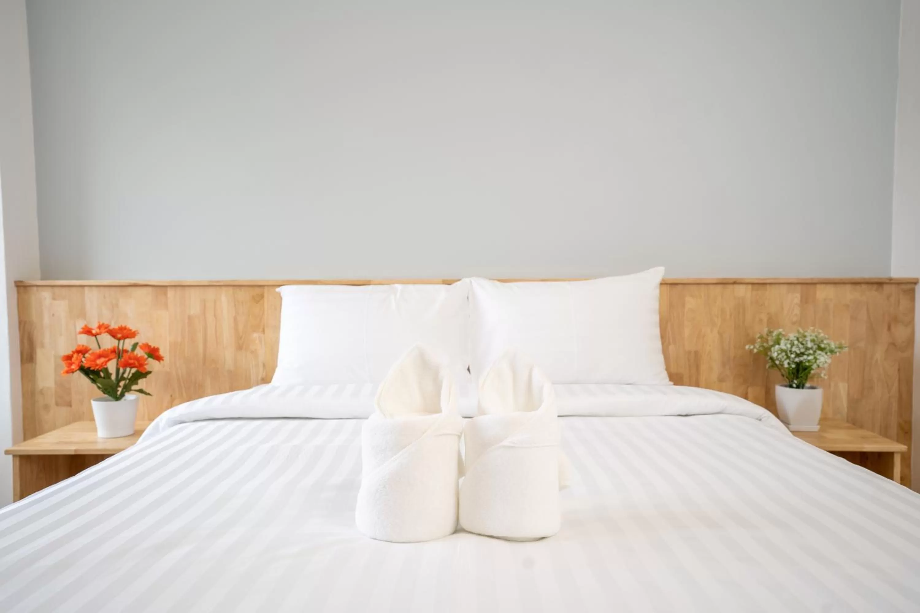 Bed in Meesuk ChiangRai Hotel, SHA Certified