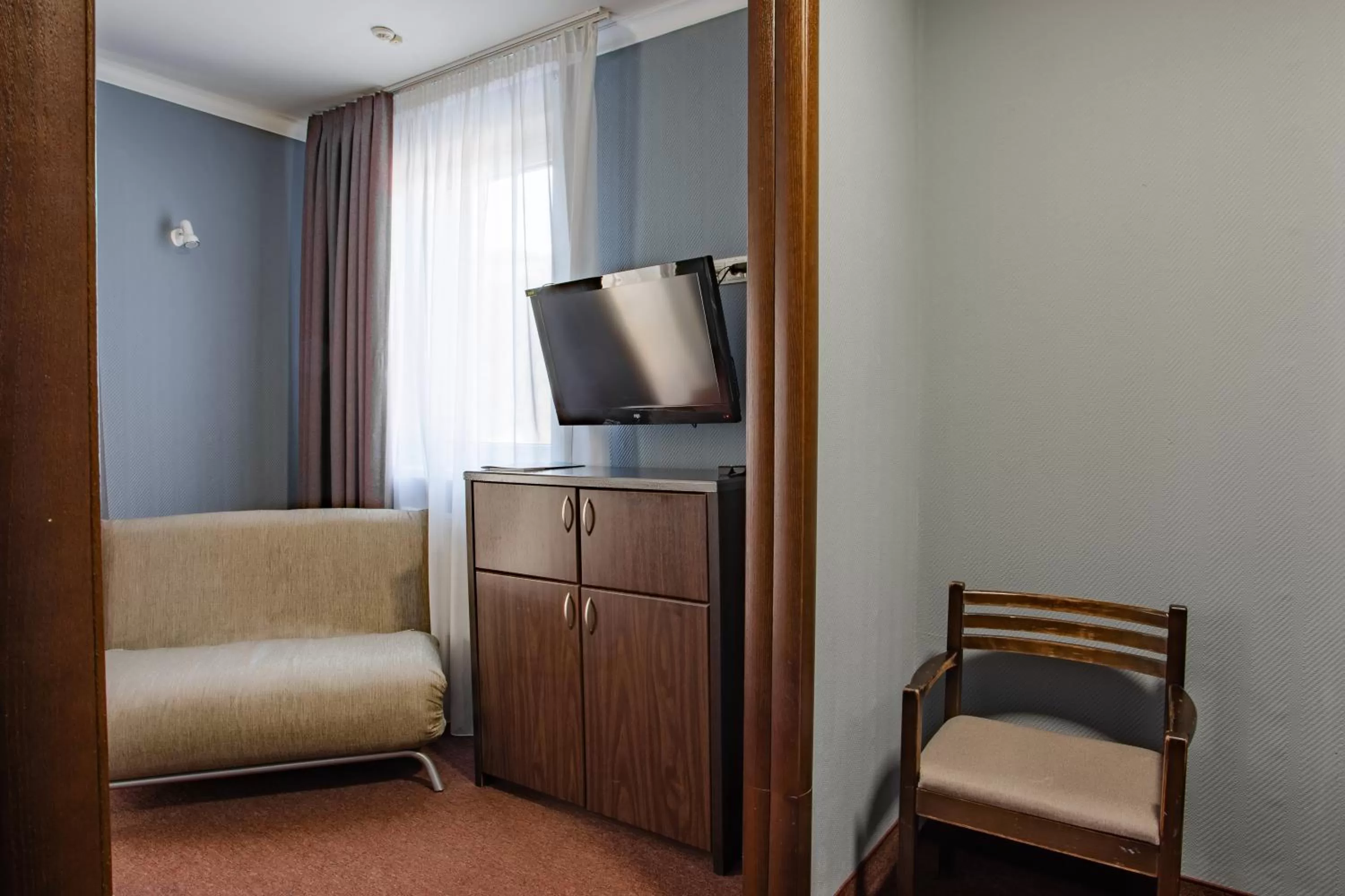 Photo of the whole room, Seating Area in Wellland Hotel