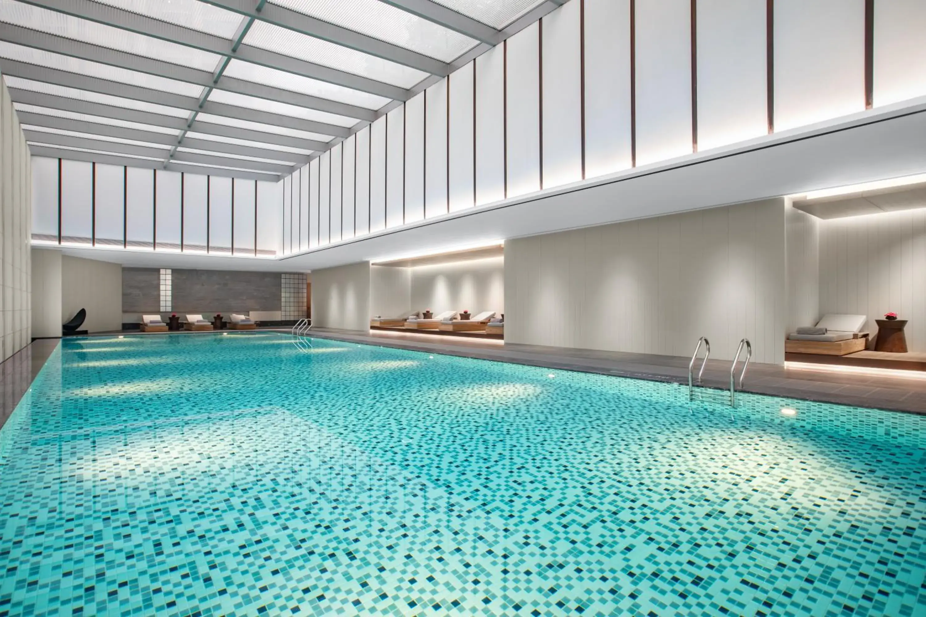 Swimming Pool in Crowne Plaza Jiangmen Binjiang, an IHG Hotel