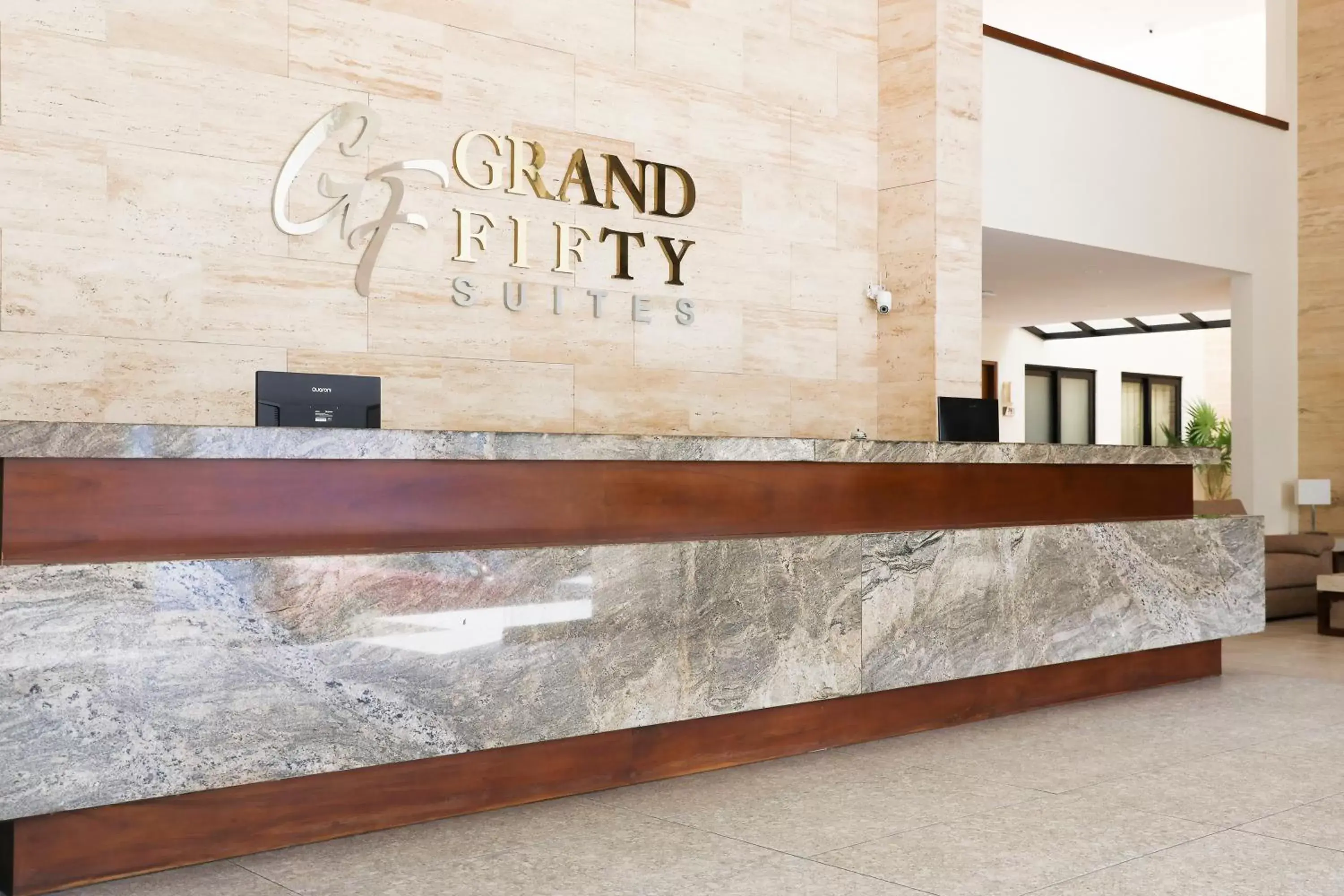 Property logo or sign in Grand Fifty Suites