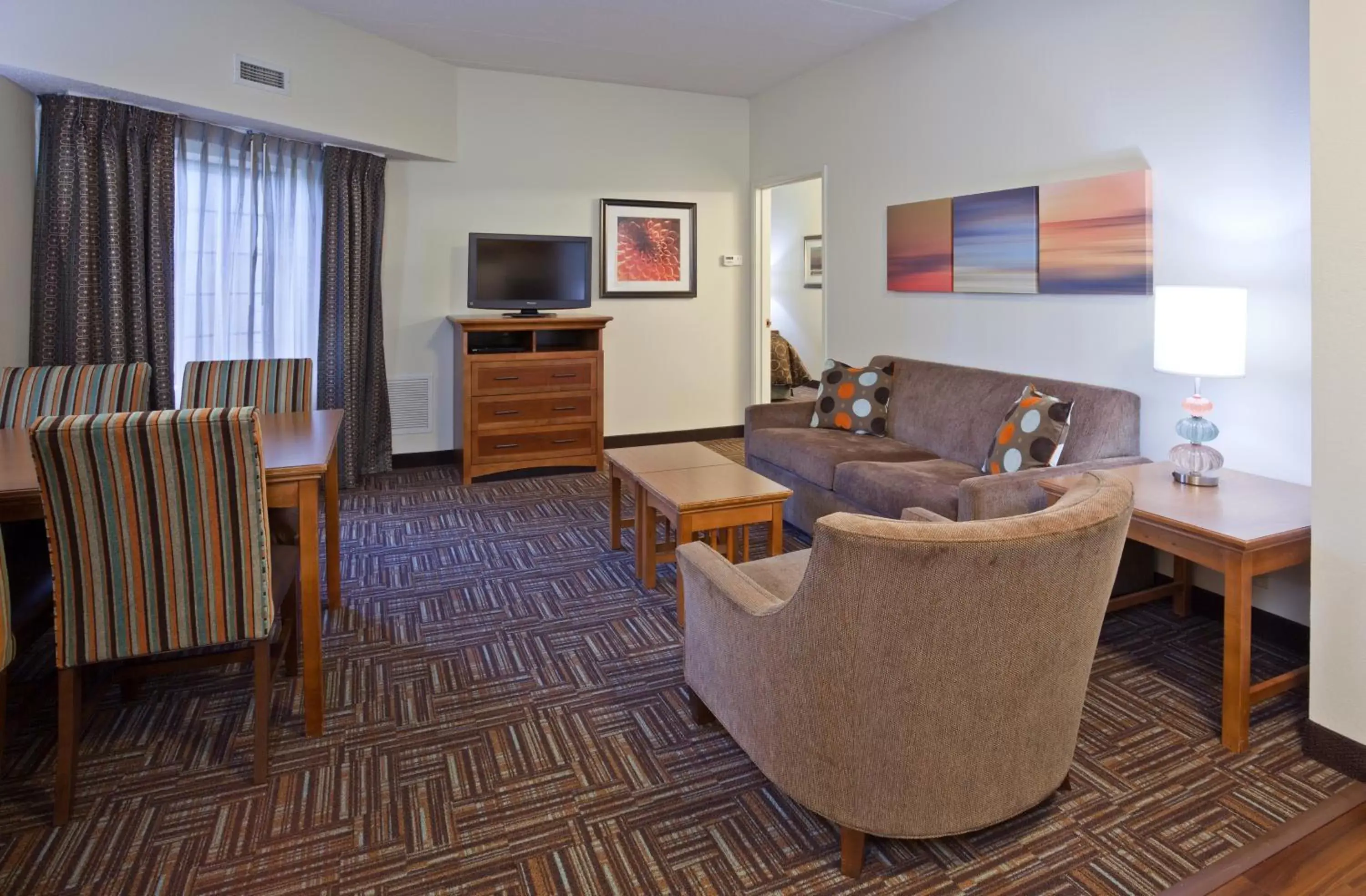 Living room, Seating Area in Staybridge Suites Minneapolis-Bloomington, an IHG Hotel