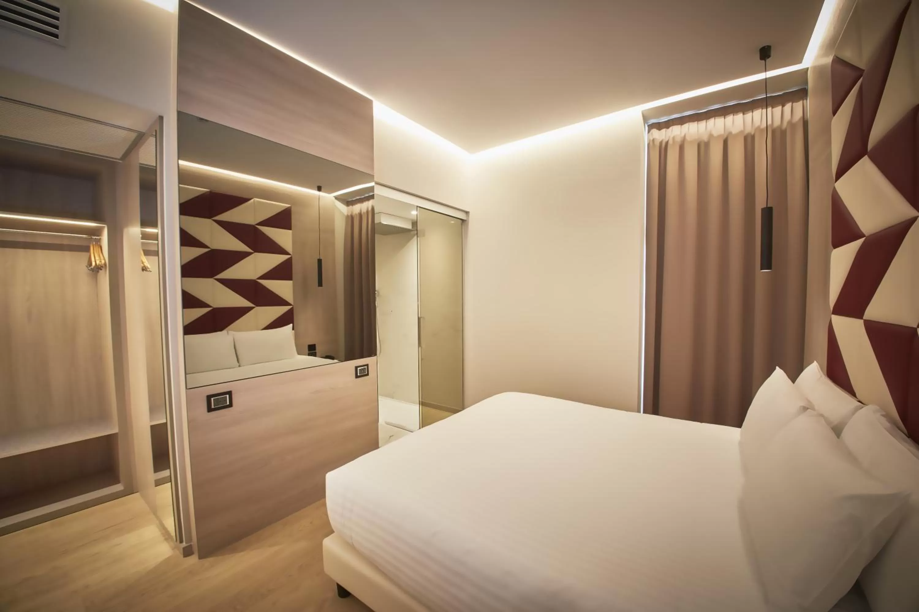 Bedroom, Bed in iH Hotels Milano Ambasciatori