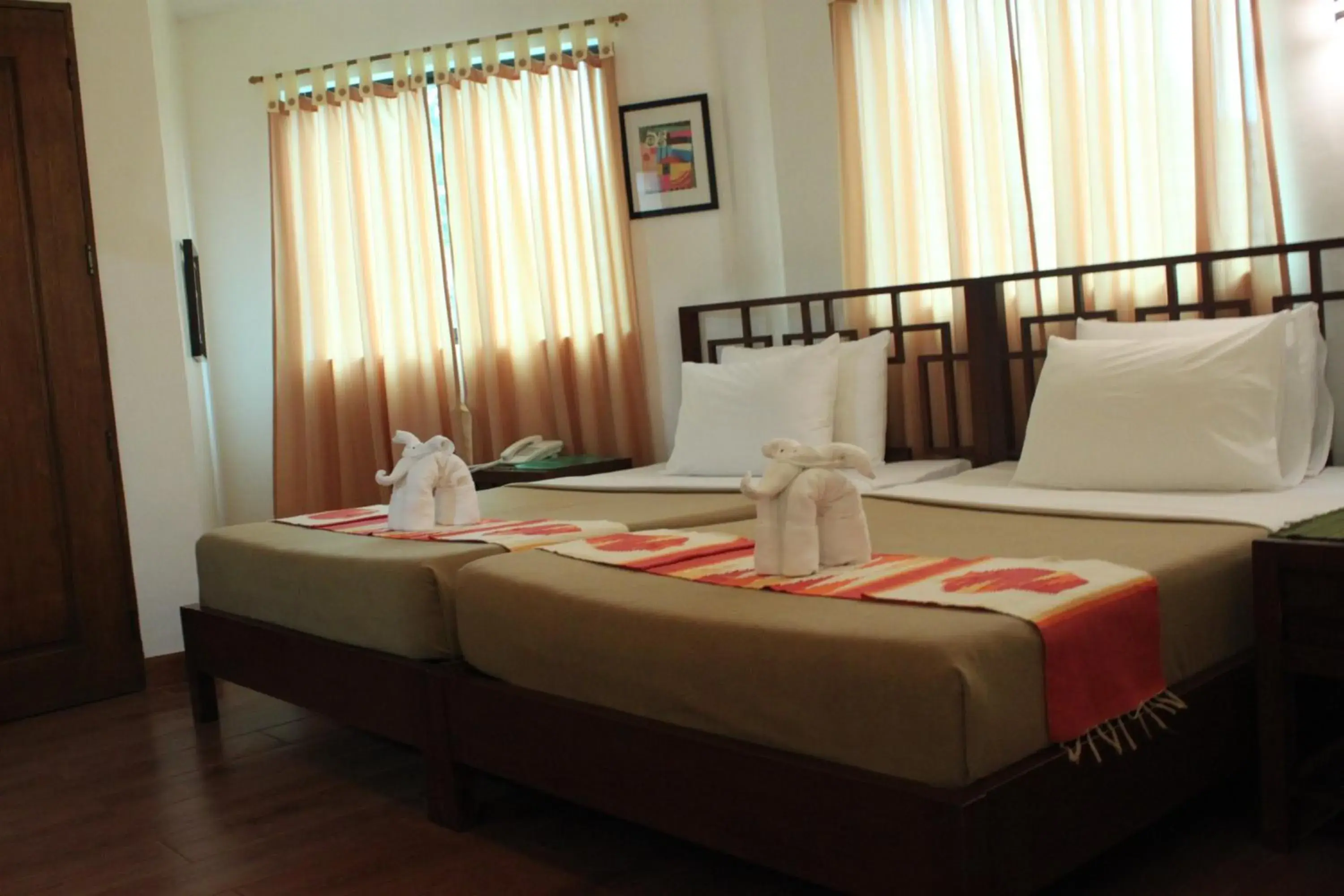 Bed in Coron Hilltop View Resort