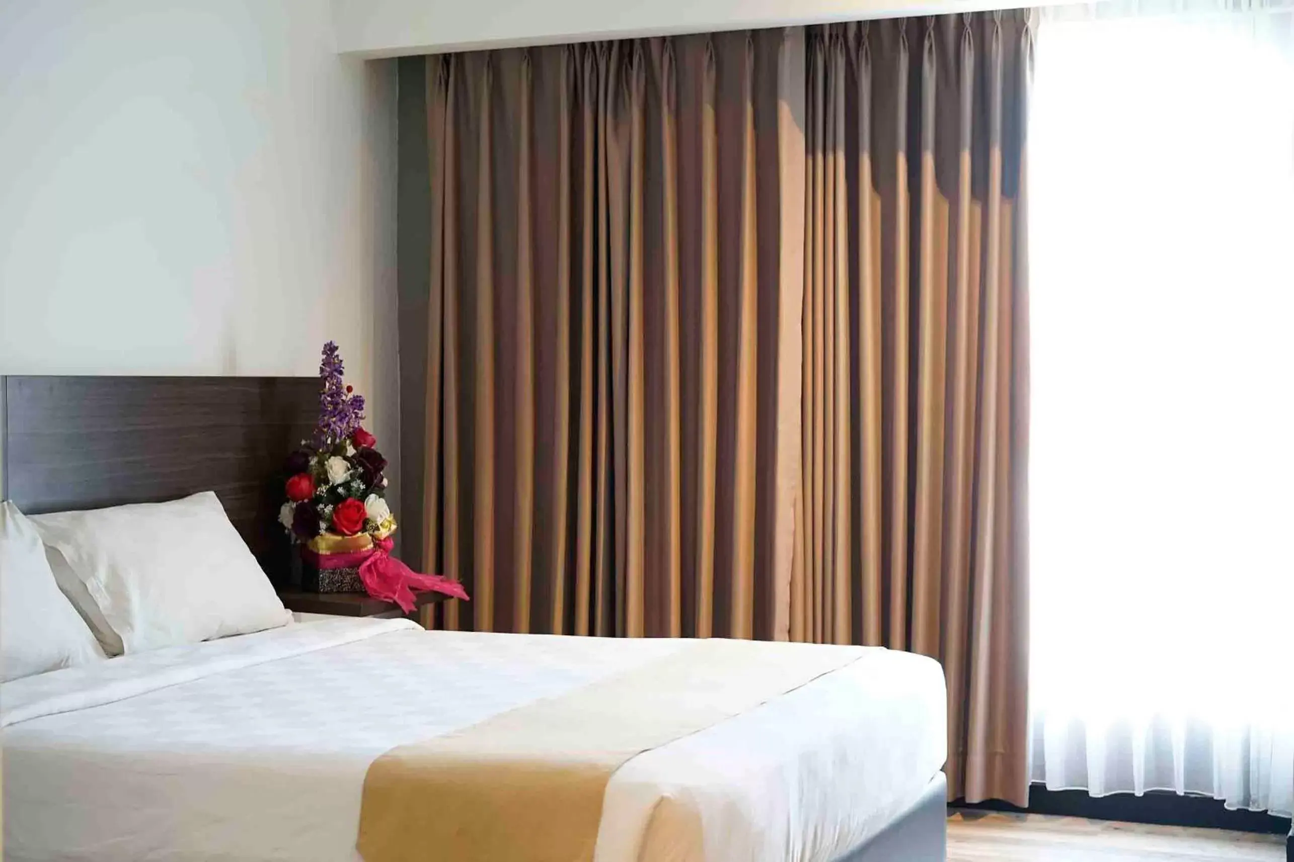 Bed in Yunna Hotel Lampung