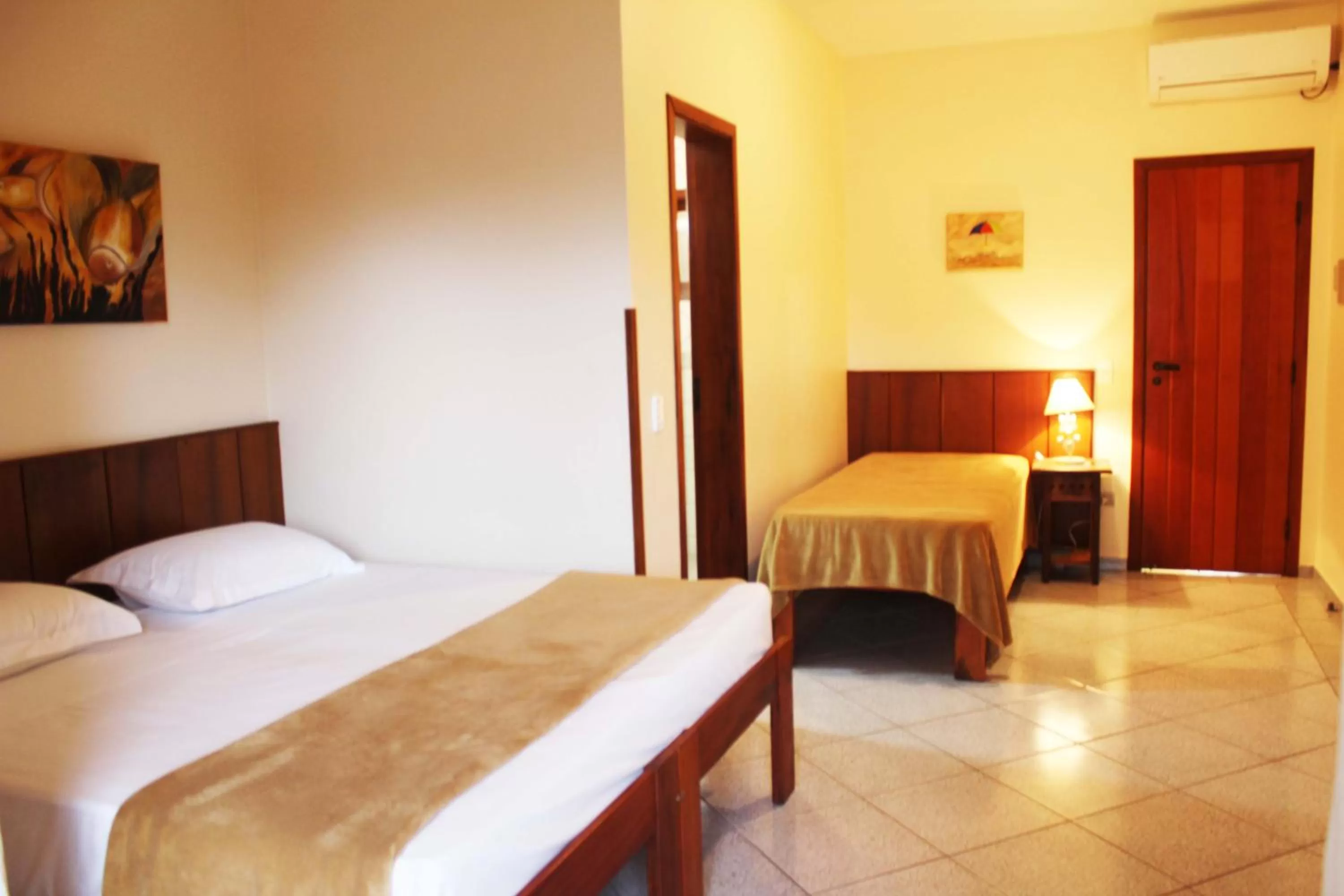 Bed in Pousada Vivamar