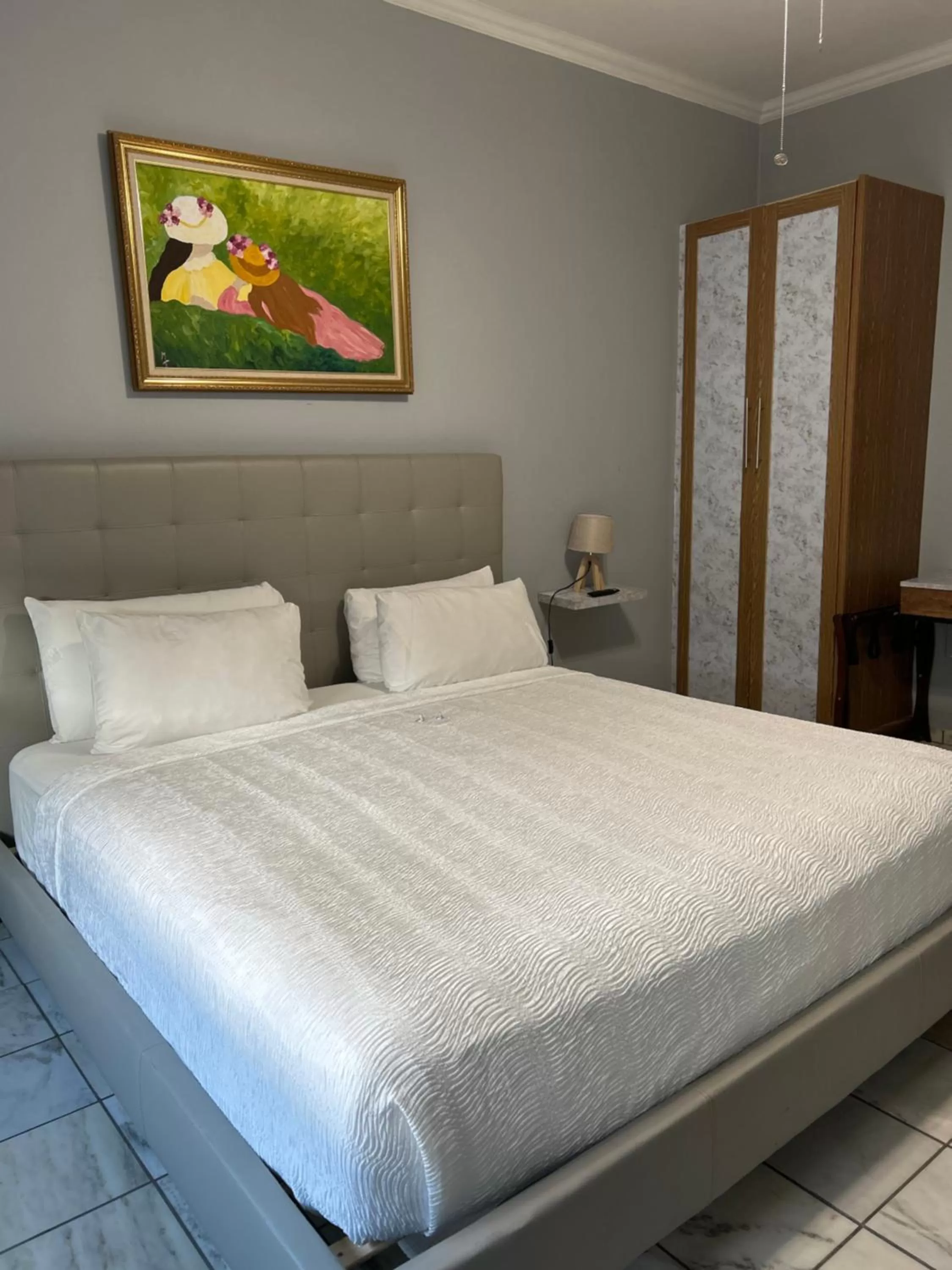 Bed in Coral Princess Hotel