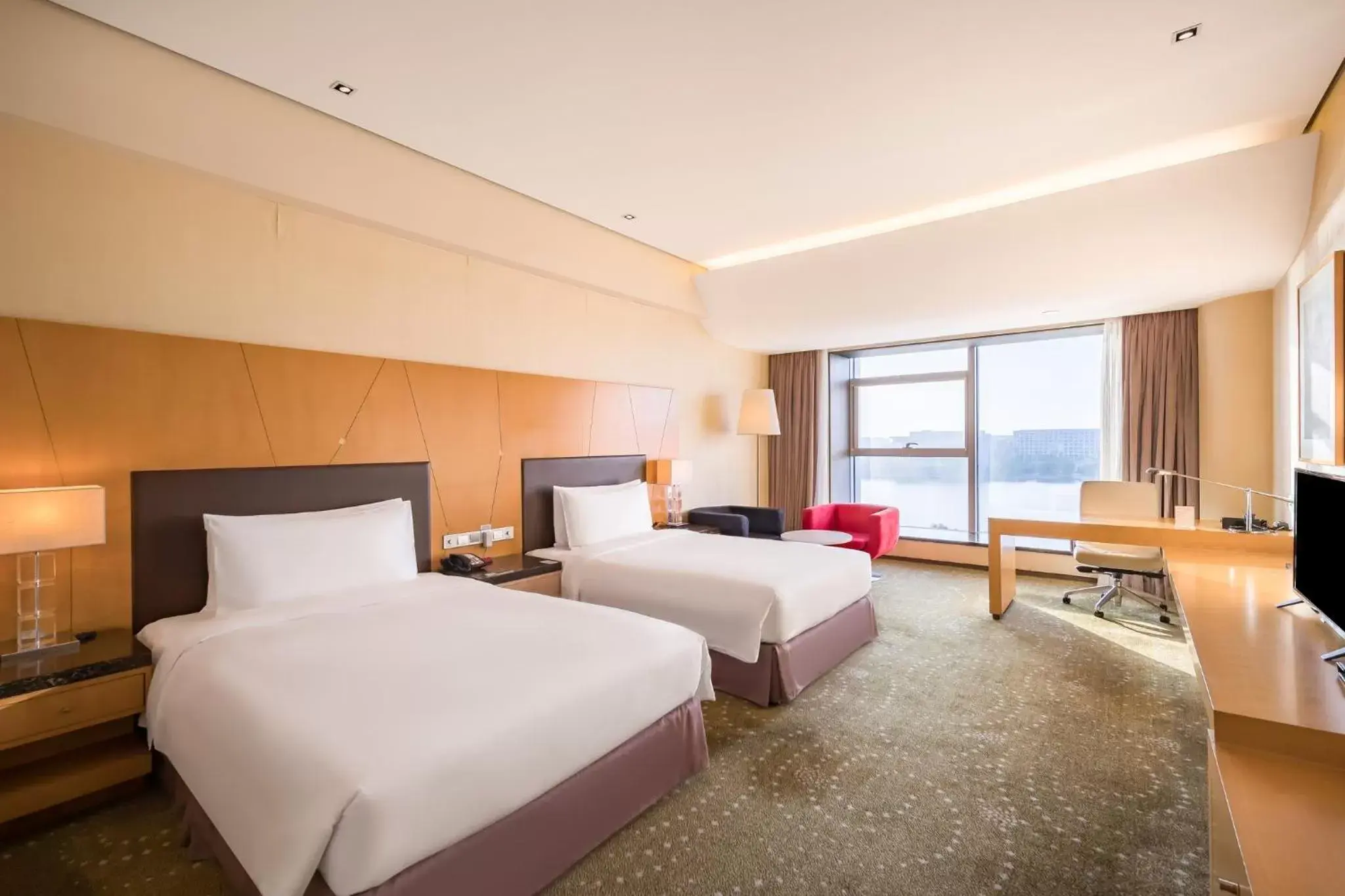 Photo of the whole room, Bed in Crowne Plaza Tianjin Binhai, an IHG Hotel