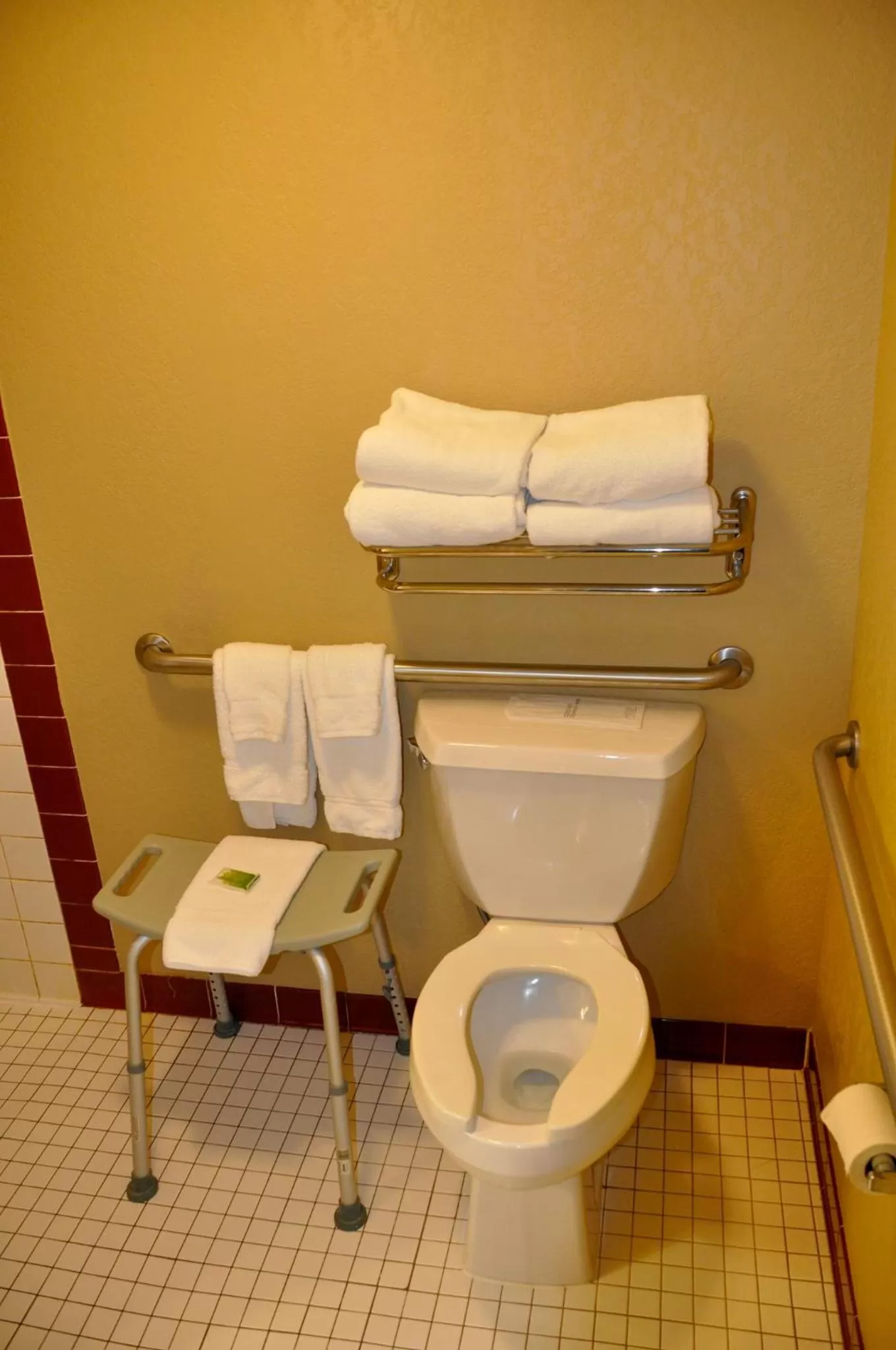 Toilet in AmericInn by Wyndham Clear Lake