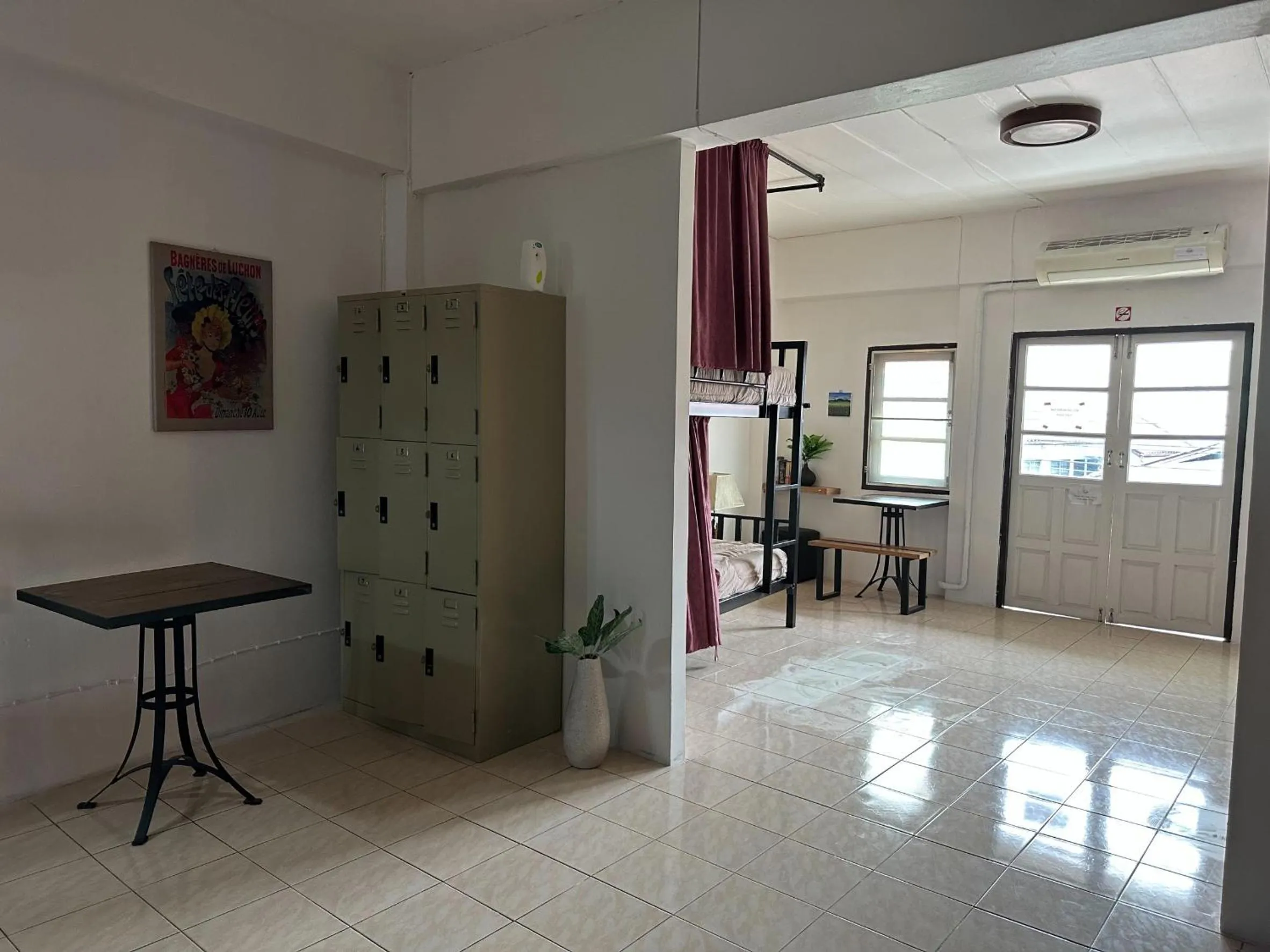 air conditioner in The Cabin Backpackers Hostel & Bar