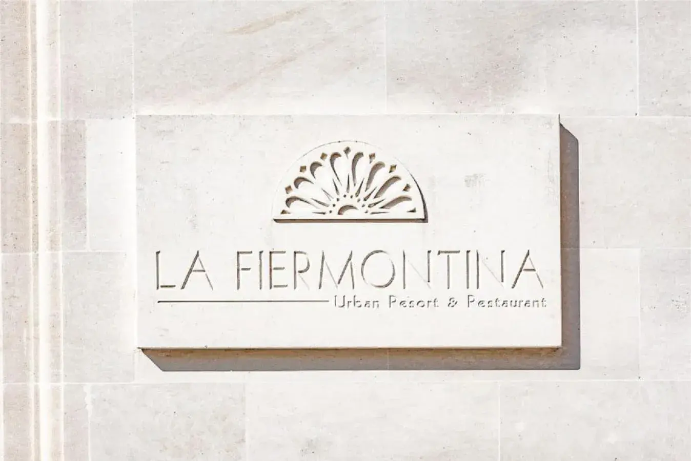 Property logo or sign in La Fiermontina - luxury home hotel