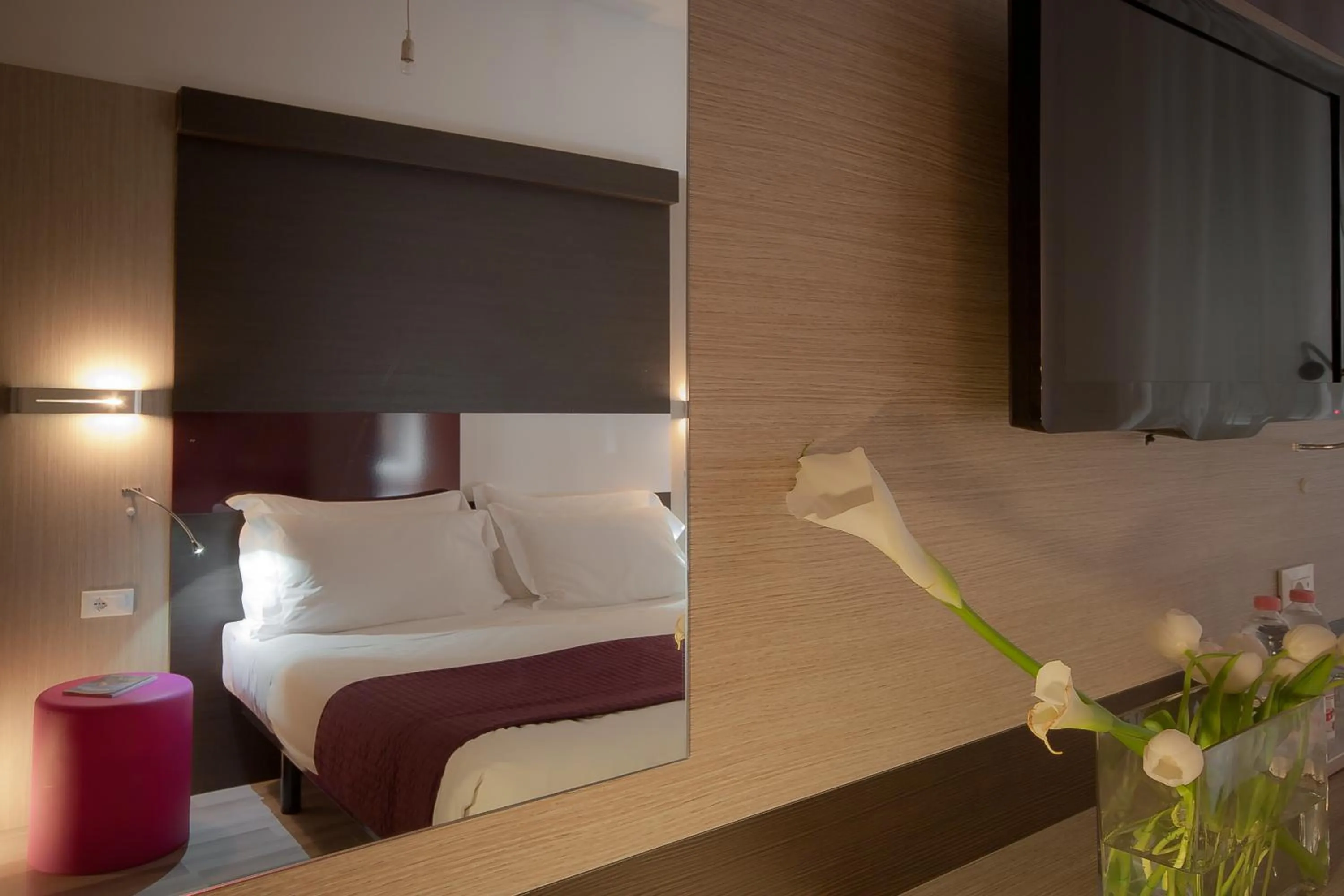 Bed in Genius Hotel Downtown