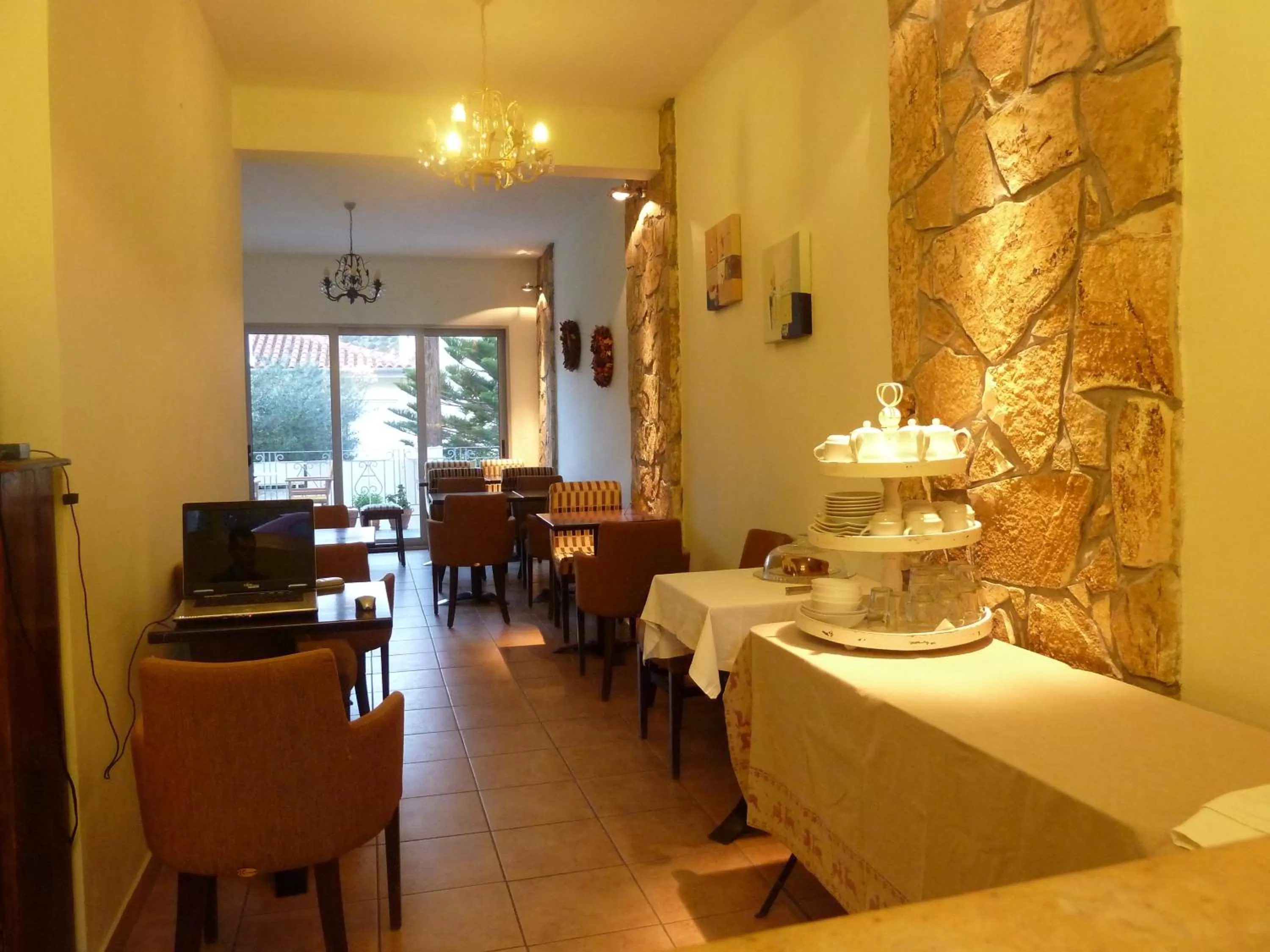 Communal lounge/ TV room in Zoe Pension