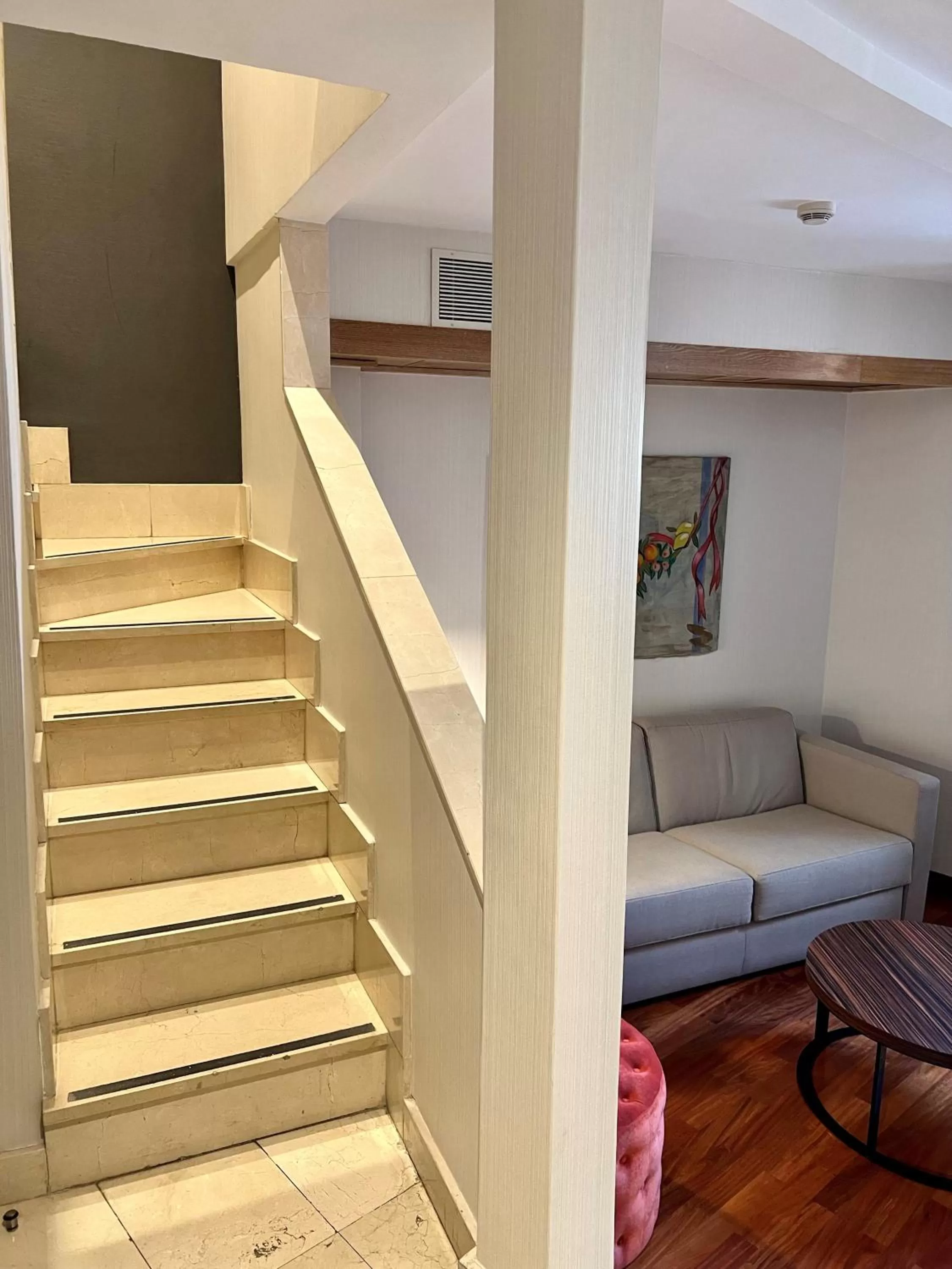 Seating area in NH Collection Salamanca Palacio de Castellanos