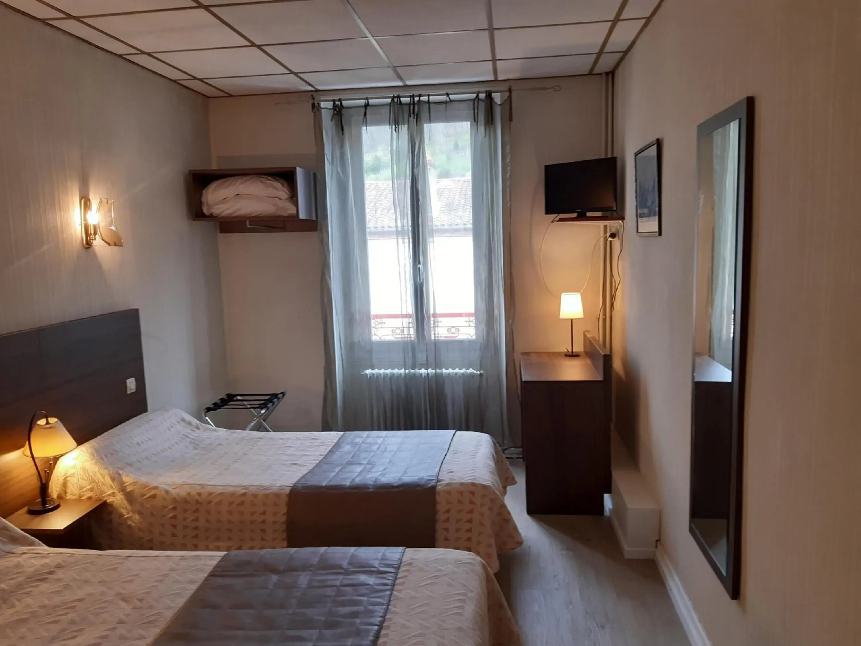 Photo of the whole room, Bed in Hôtel Le Boulevard