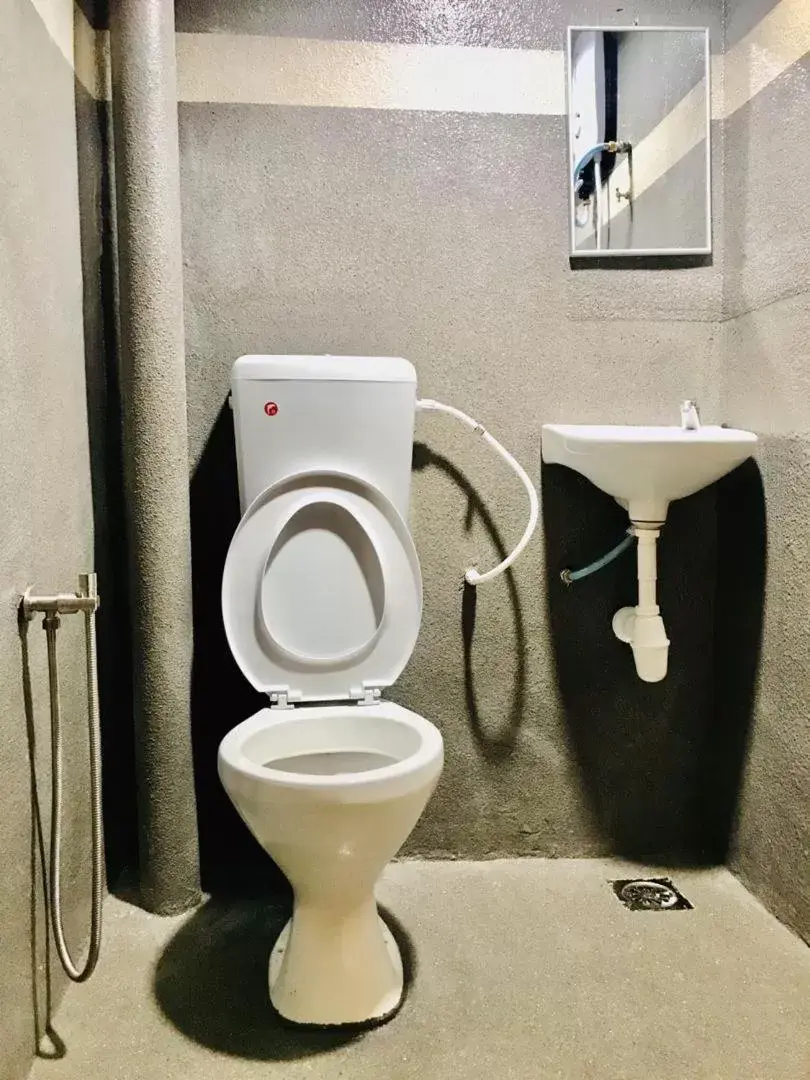 Toilet, Bathroom in Highway Times Inn Hotel