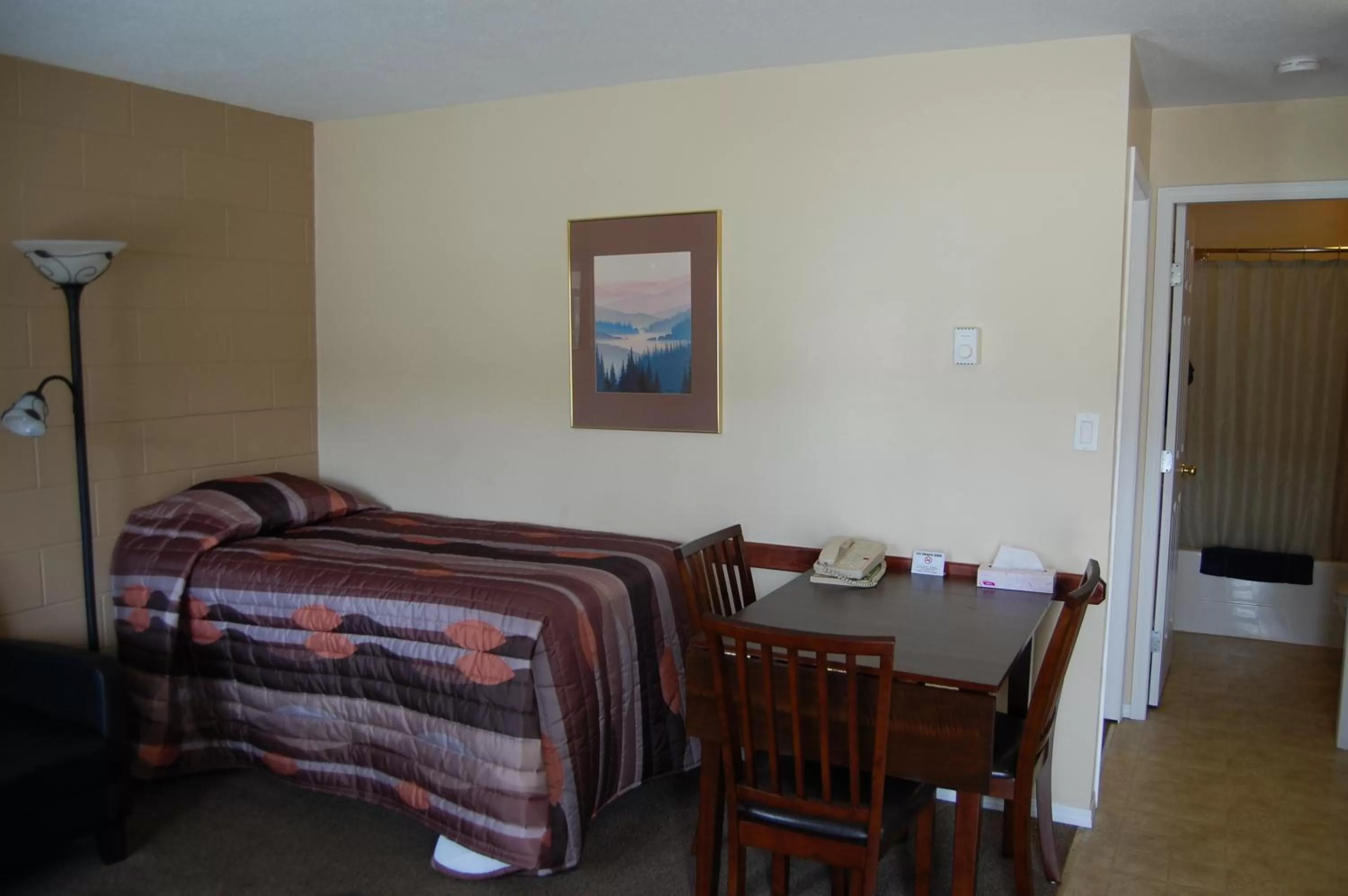 Bed in Monte Carlo Motel