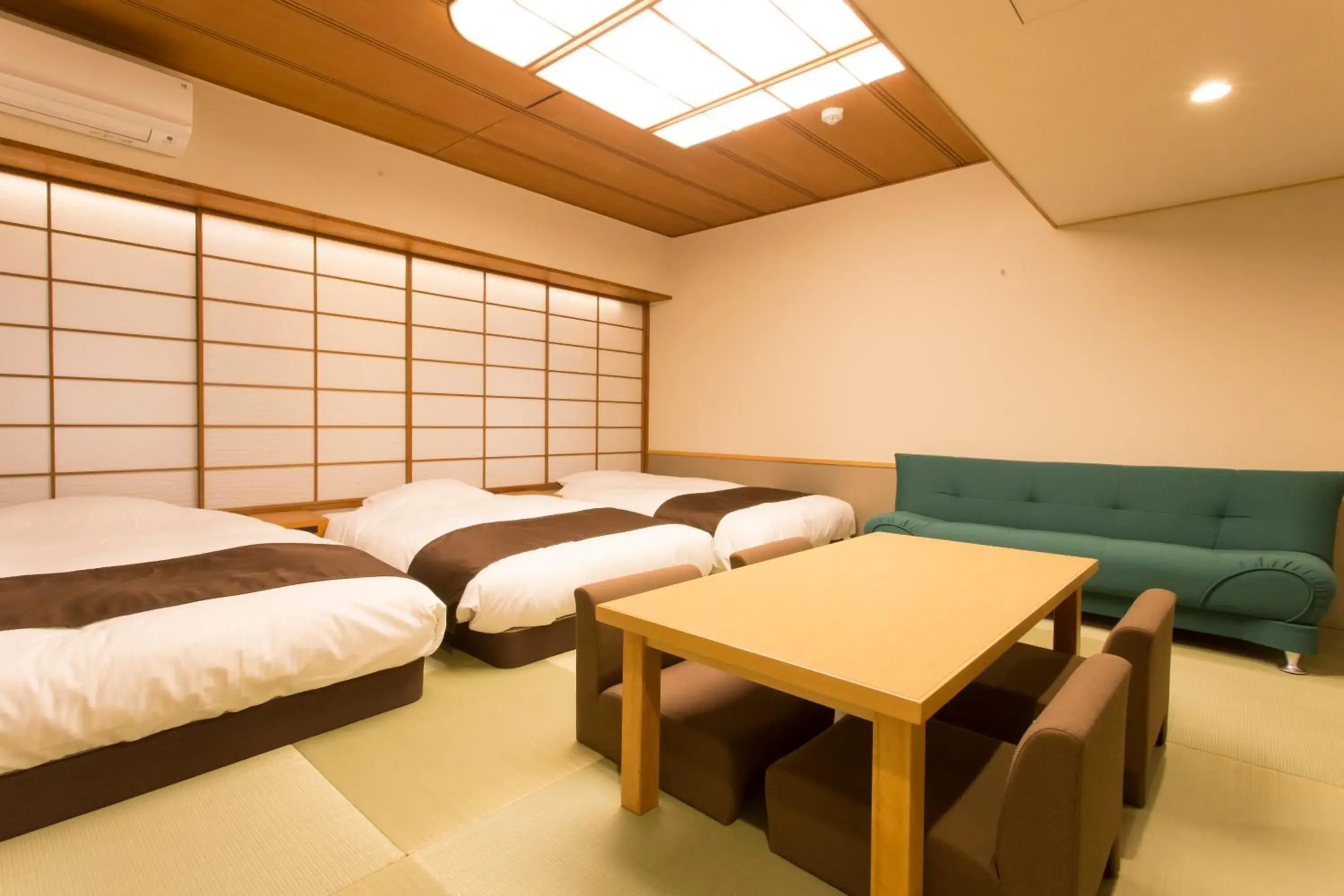 Bed in Osaka River Side Hotel