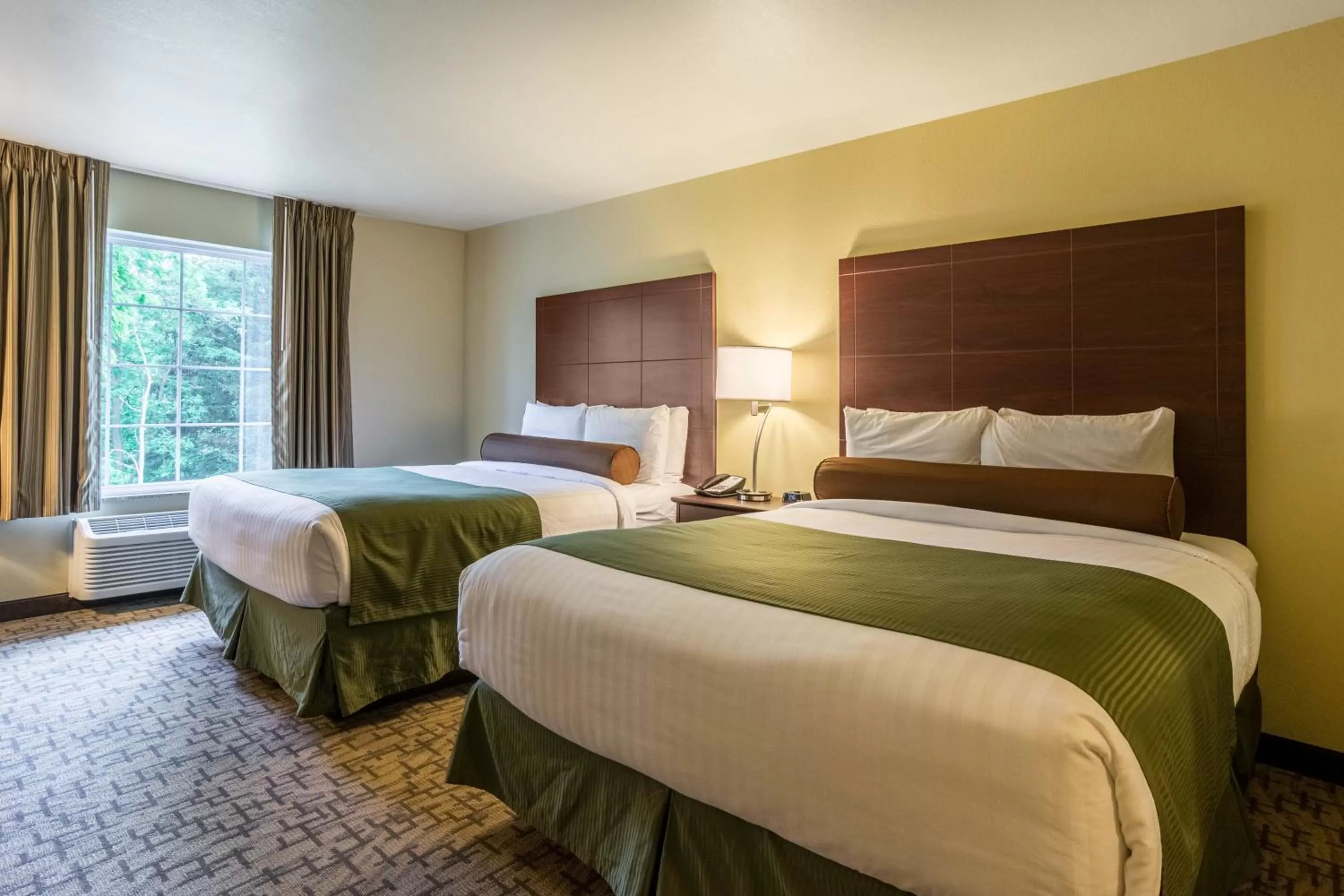 Deluxe Queen Room in Cobblestone Hotel & Suites - Harborcreek