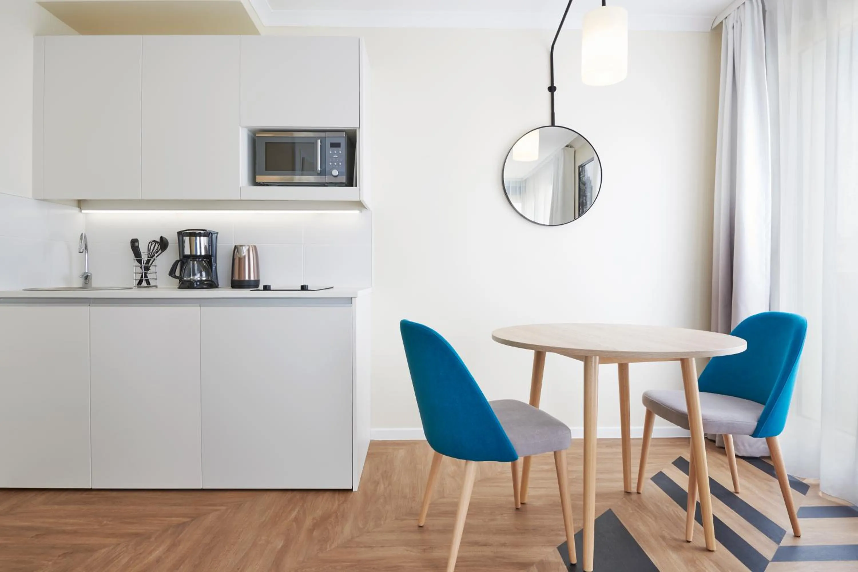 Kitchen or kitchenette in Aparthotel Adagio Porte de Versailles