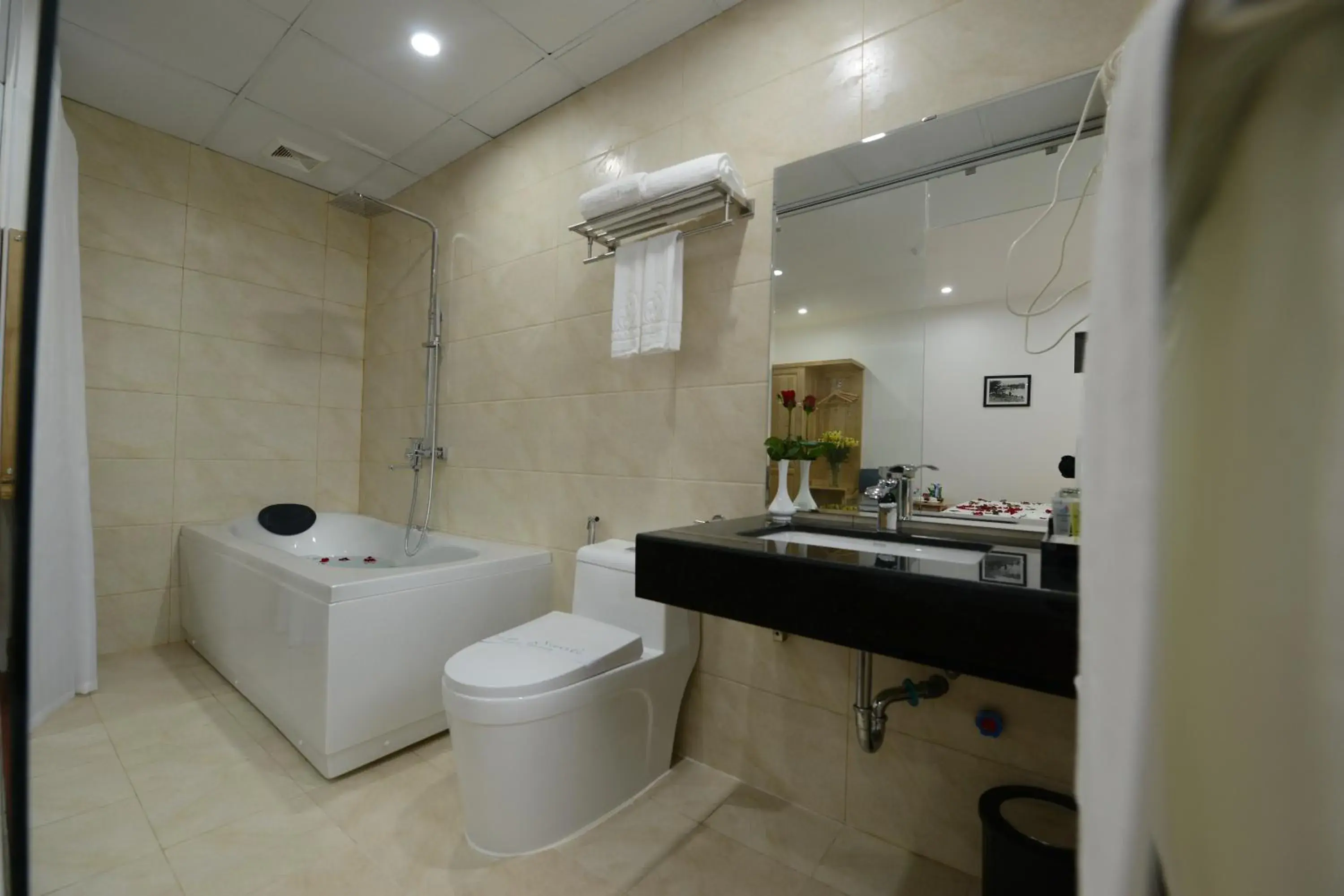 Bathroom in Blue Hanoi Inn City Hotel