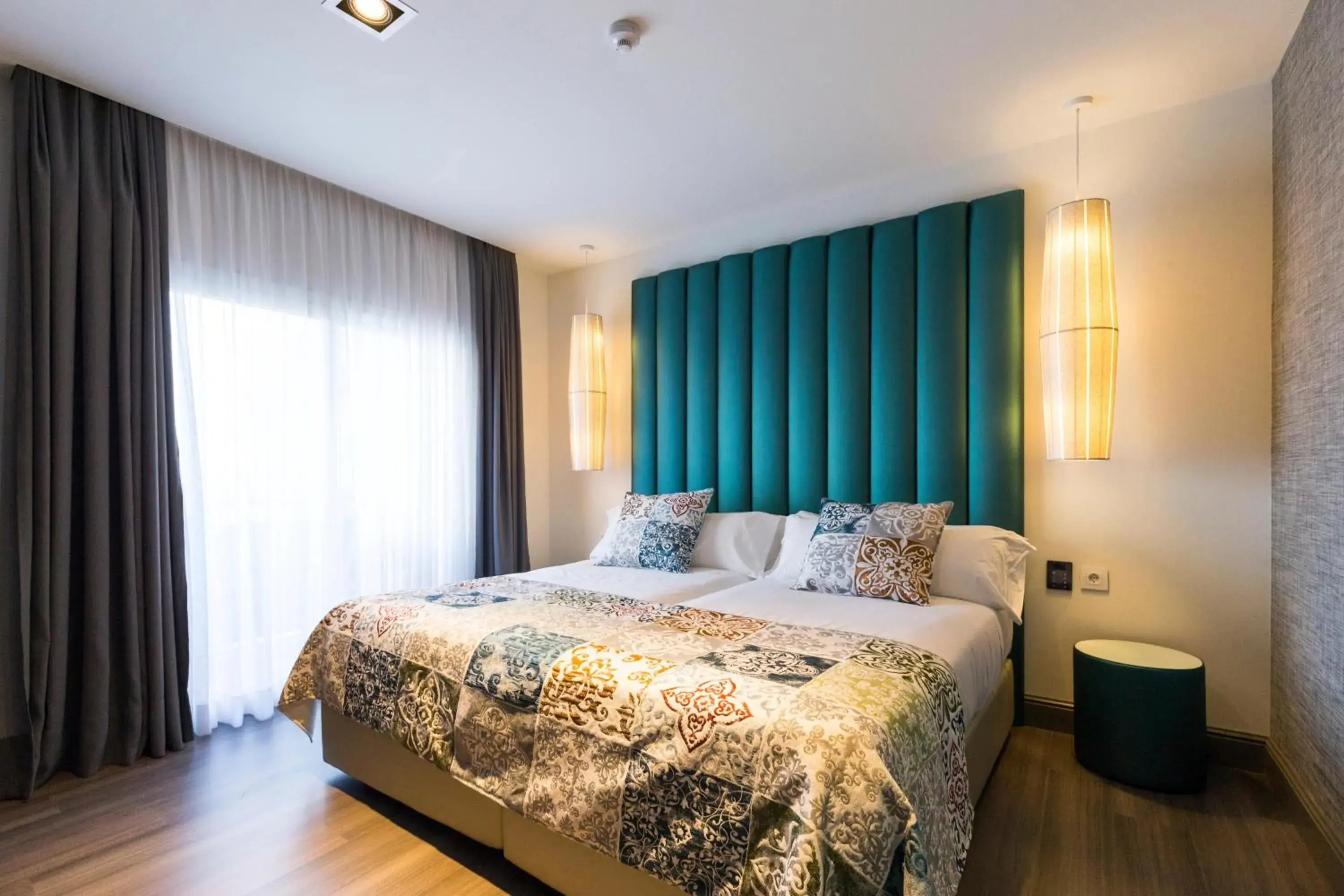 Bed in Sant Jordi Boutique Hotel