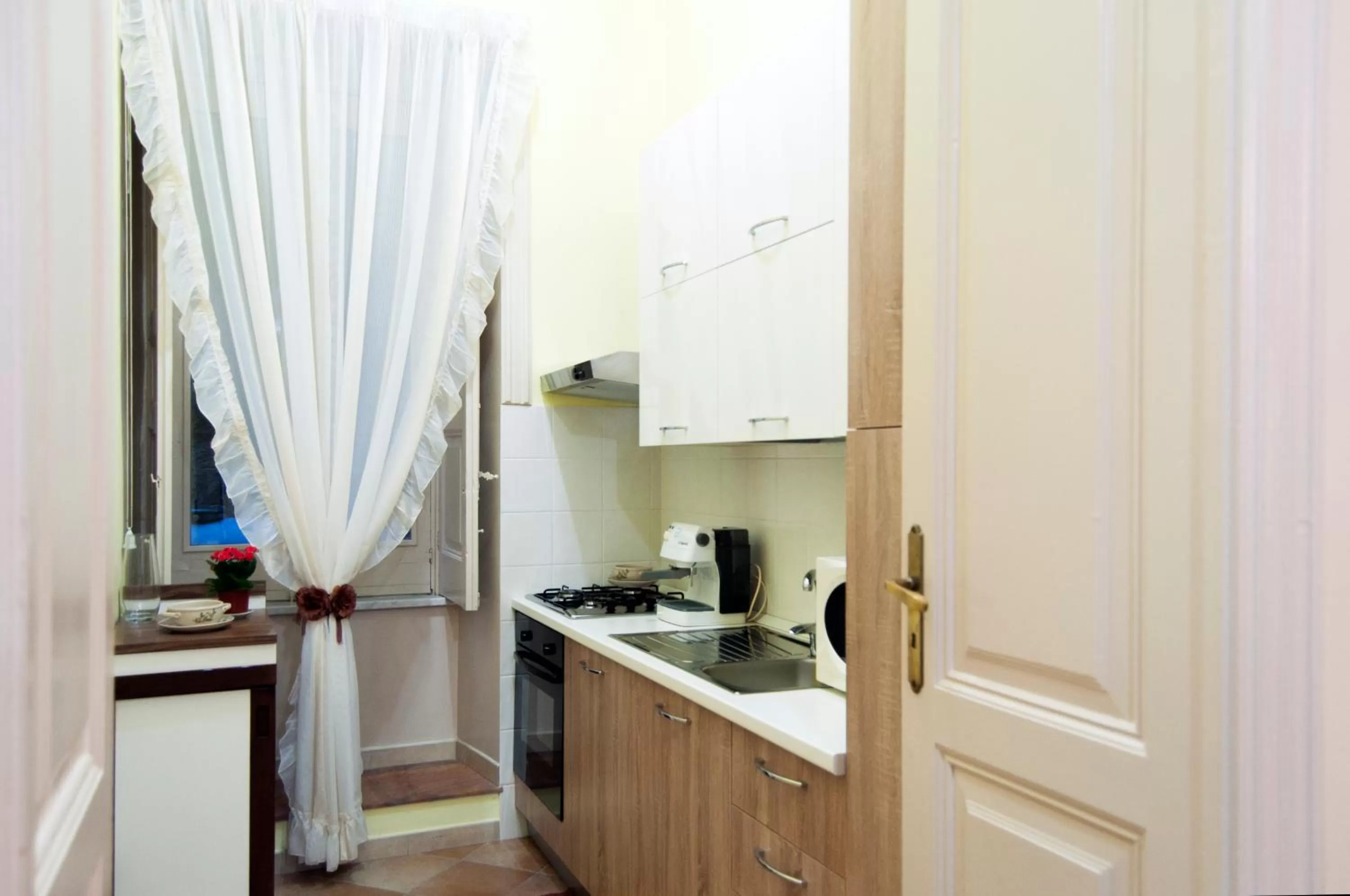 Kitchen/Kitchenette in B&B Villa Roma