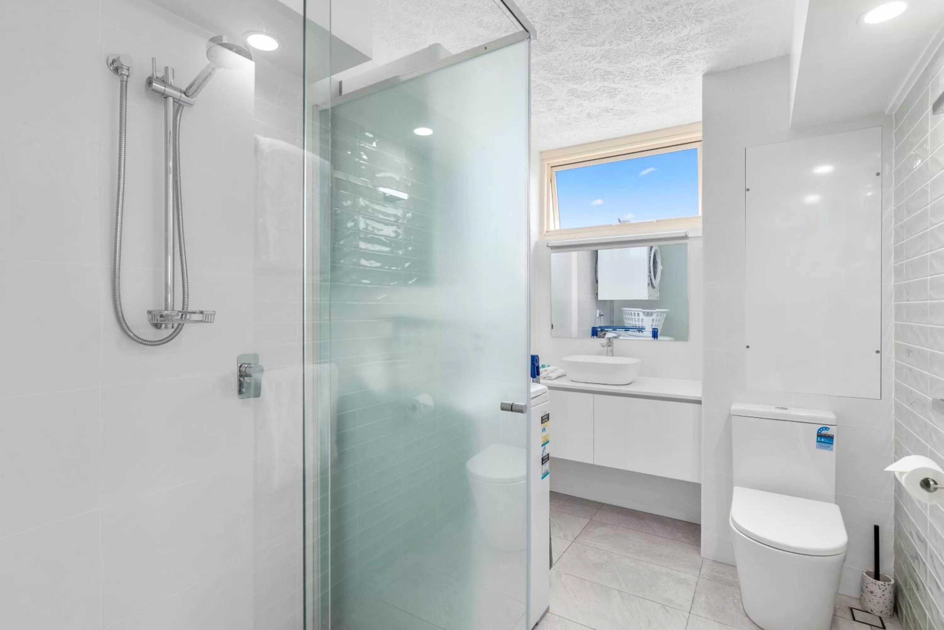 Shower in 84 The Spit Holiday Apartments