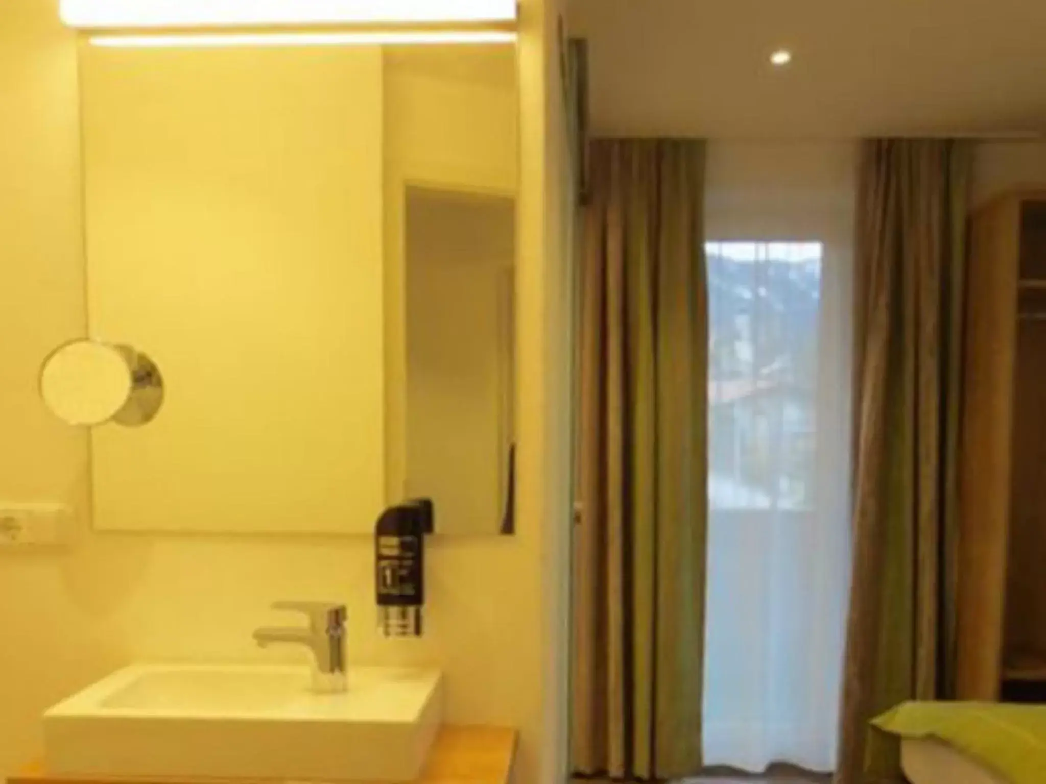 Photo of the whole room, Bathroom in Hotel Alp Inn