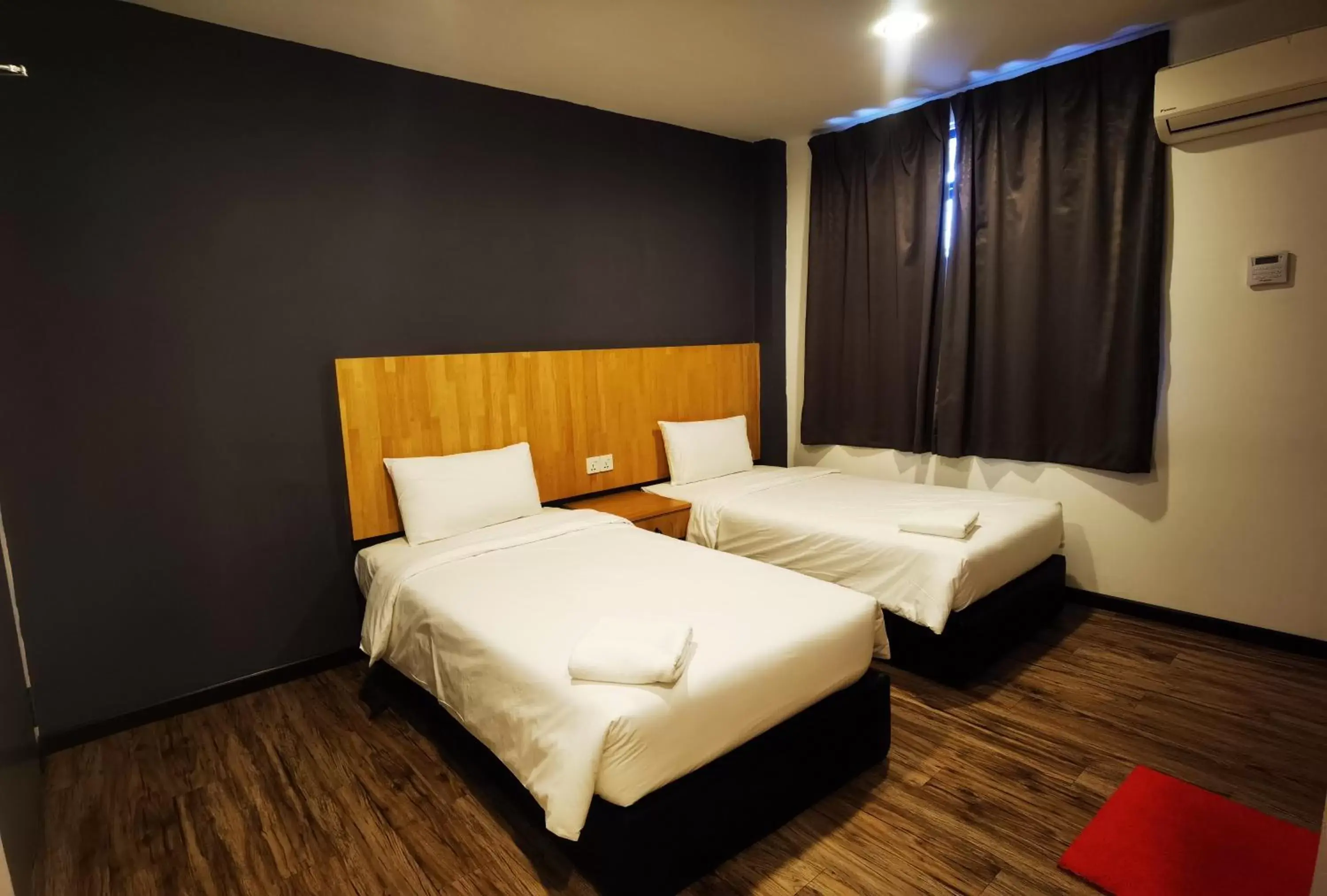 Bed in 3-Plus Hotel Bed in 3-Plus Hotel