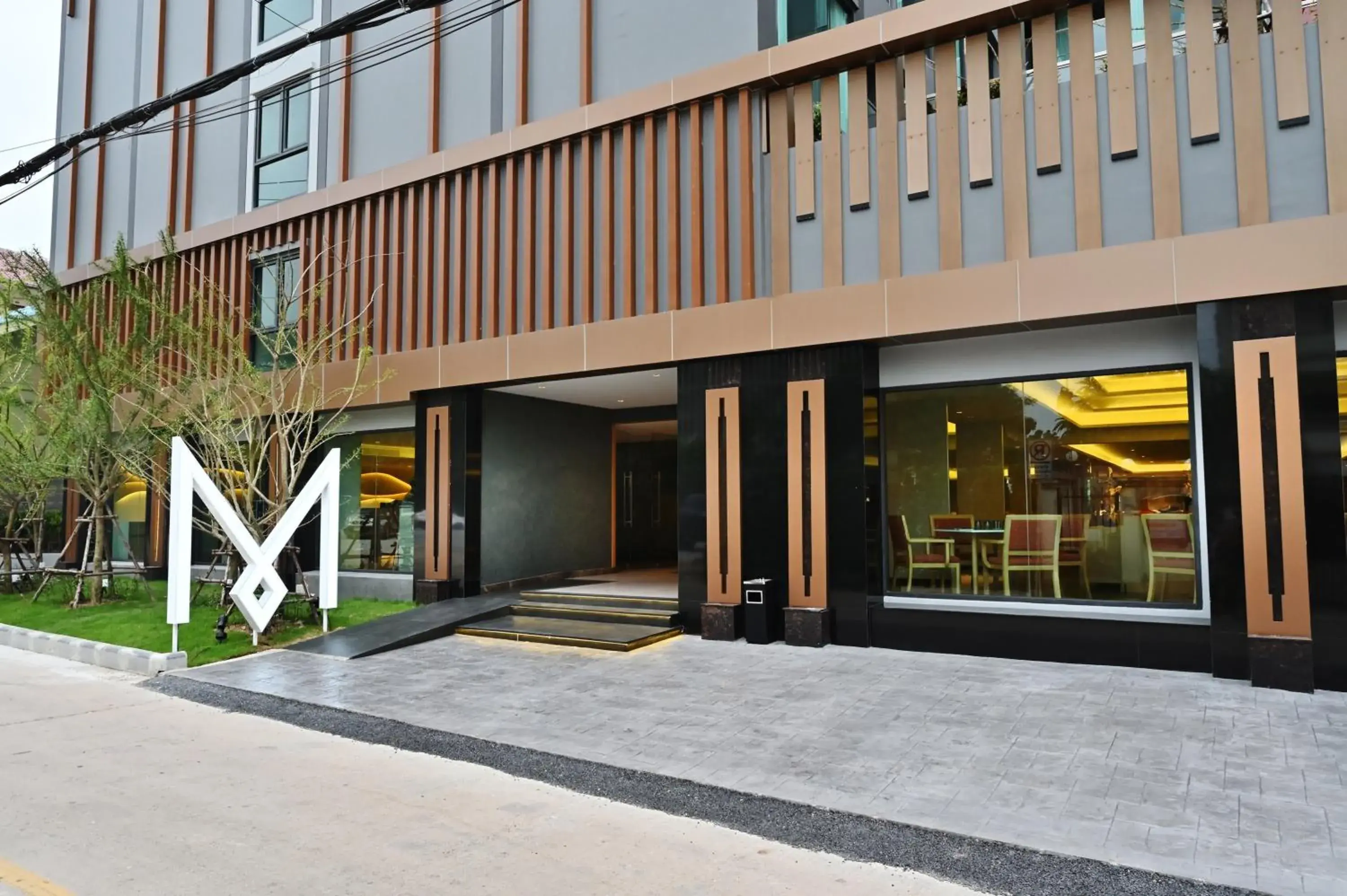 Facade/entrance, Property Building in M Pattaya Hotel - SHA Extra Plus