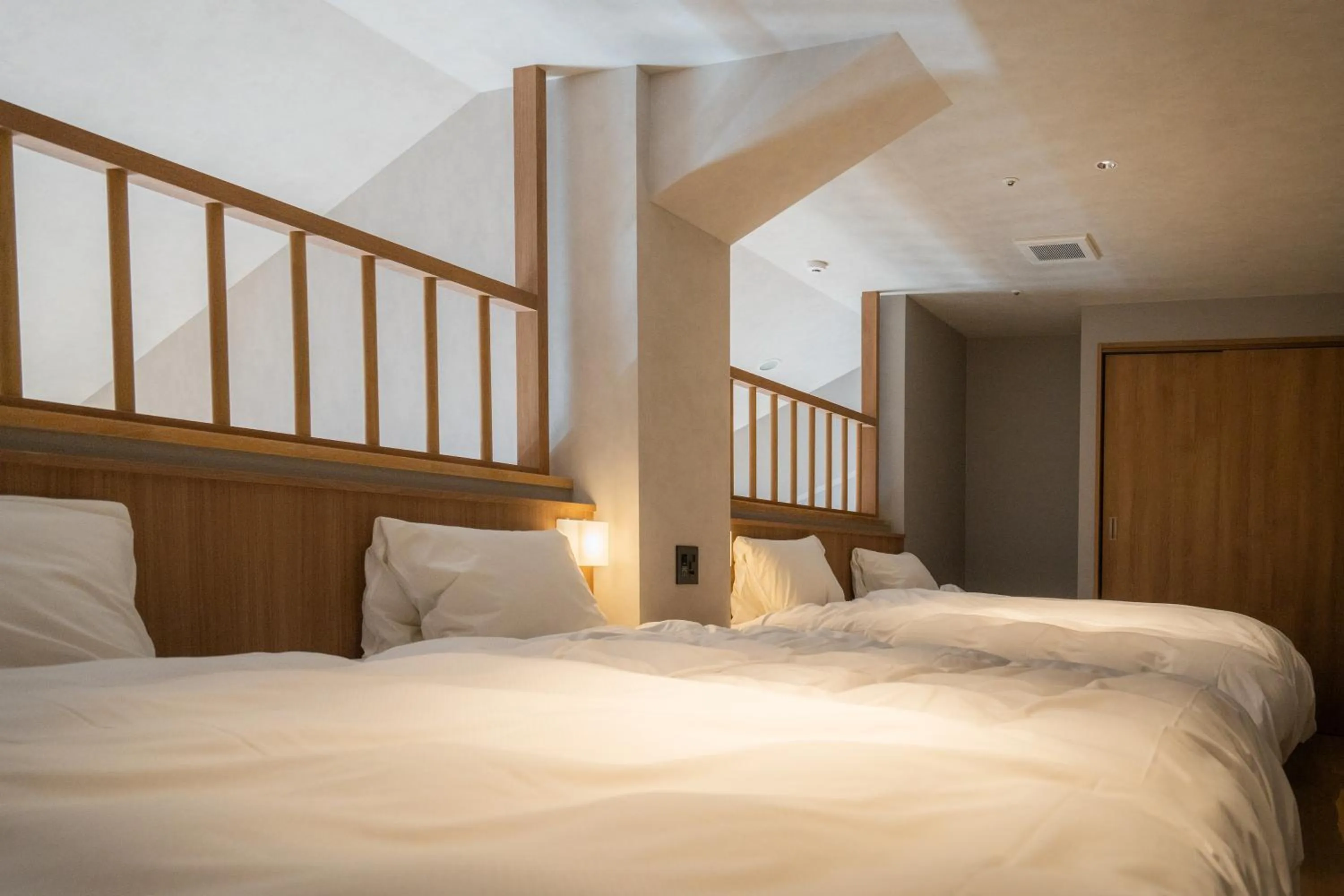 Bed in Higashikawa Asahidake Onsen Hotel Bear Monte