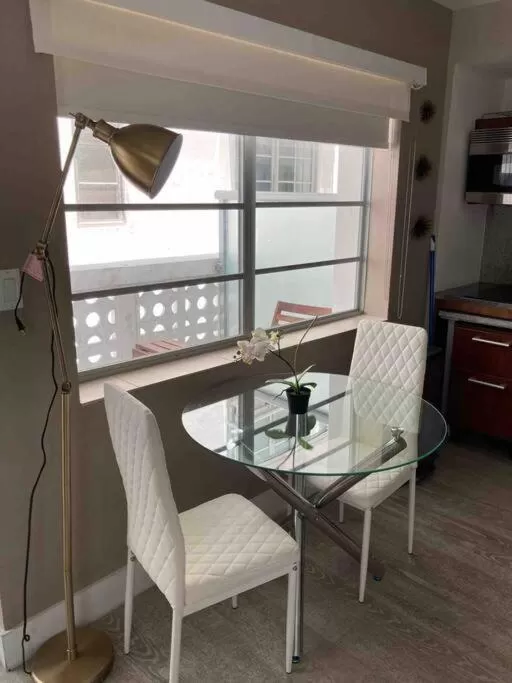 Living room, Dining Area in Suites at The Strand on Ocean Drive