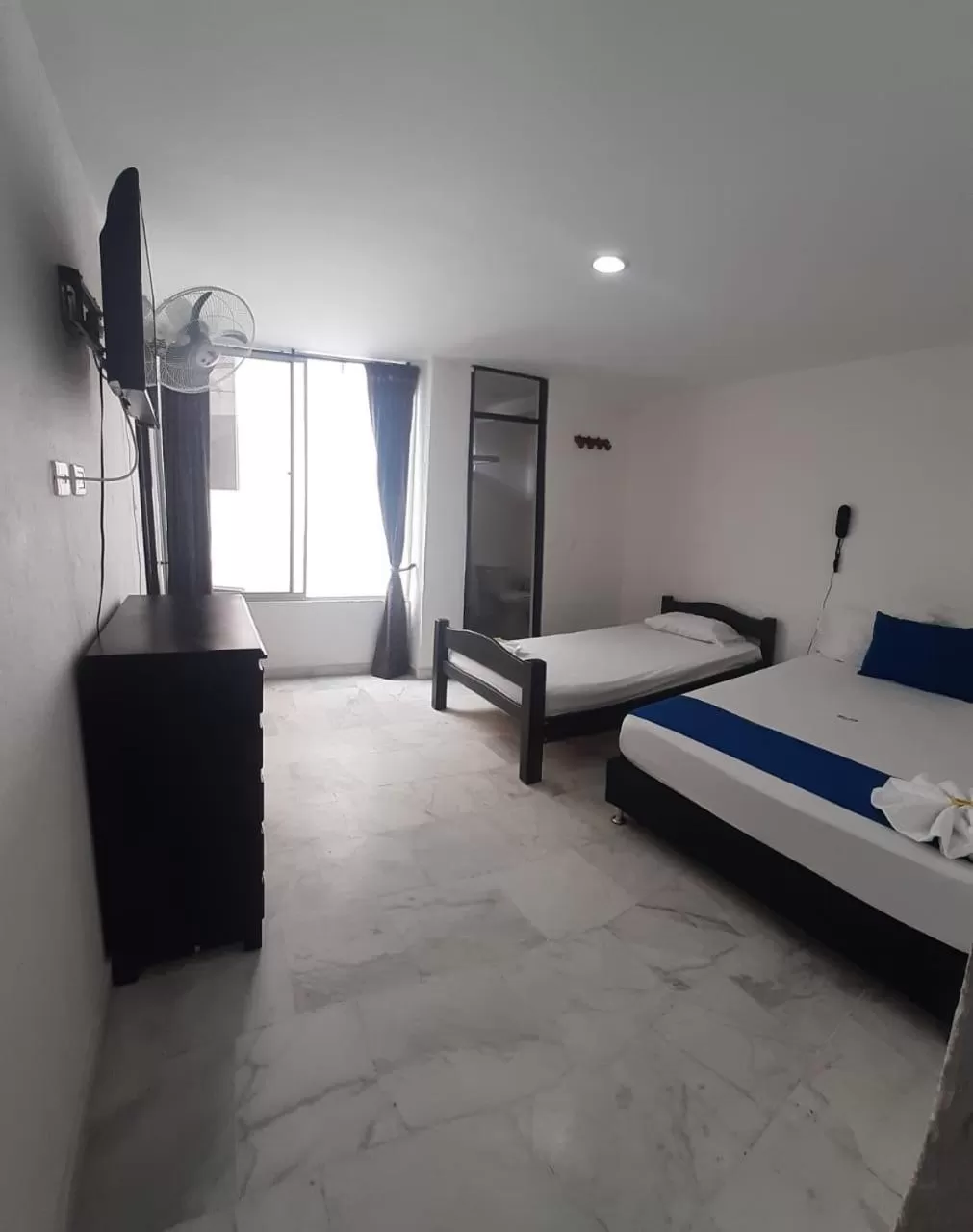 Bed in Blue Star Hotel