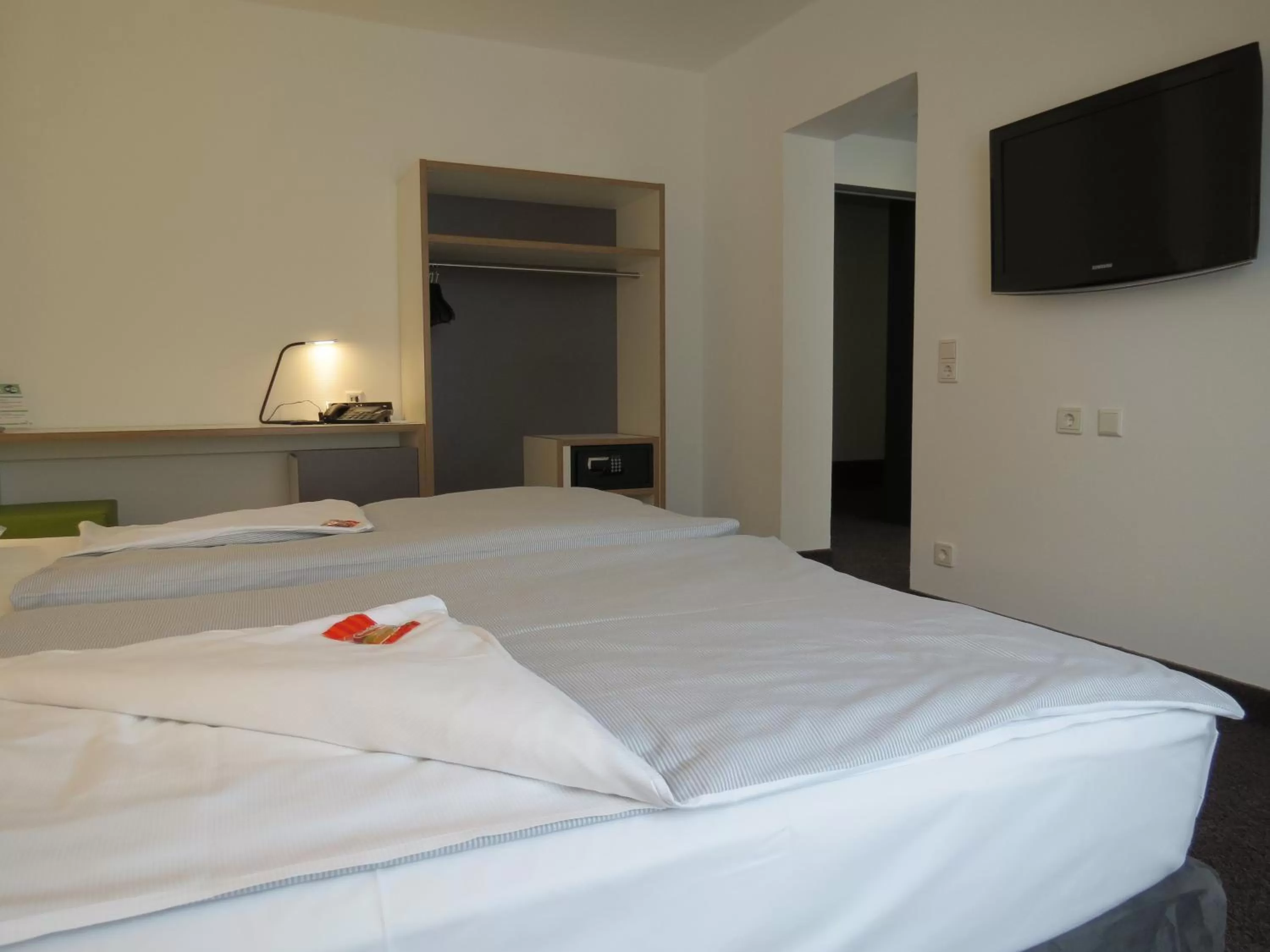 Bed in Comfor Hotel Ulm City