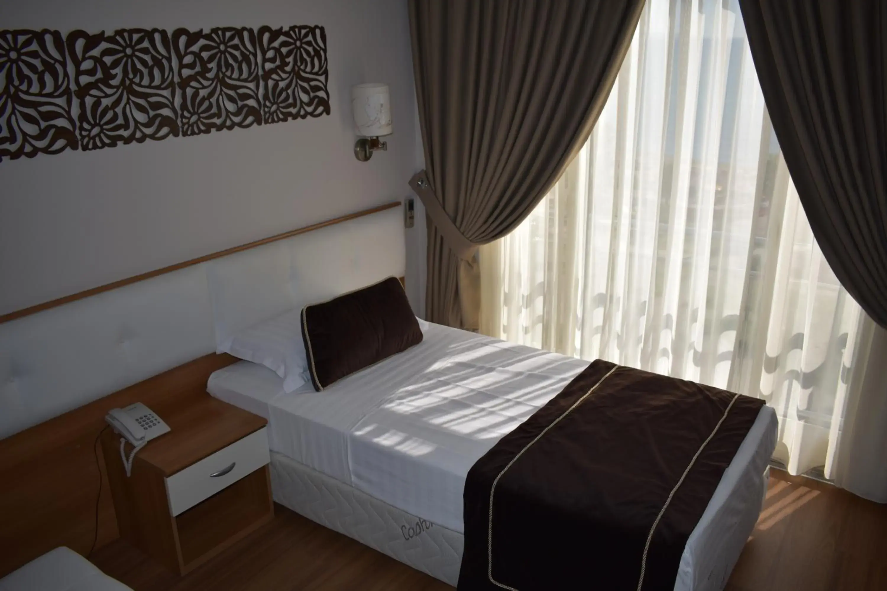 Bed in Hotel Arvi