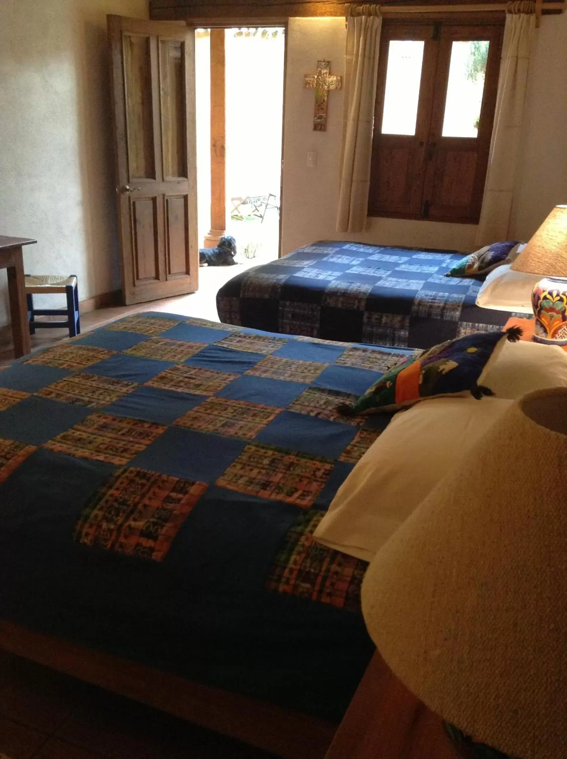 Photo of the whole room, Bed in Posada Yolihuani