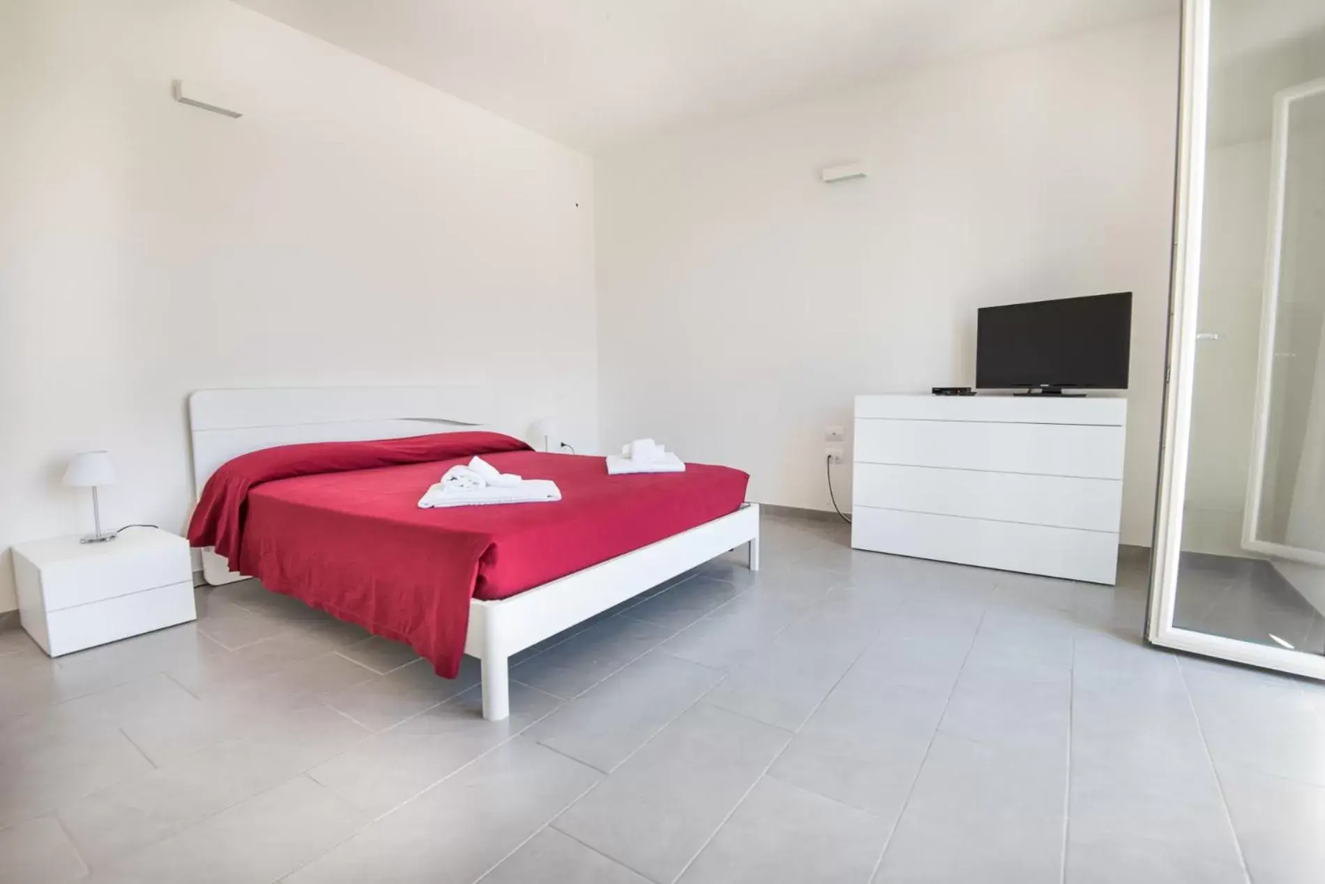 Photo of the whole room, Bed in Residence Marina Salivoli