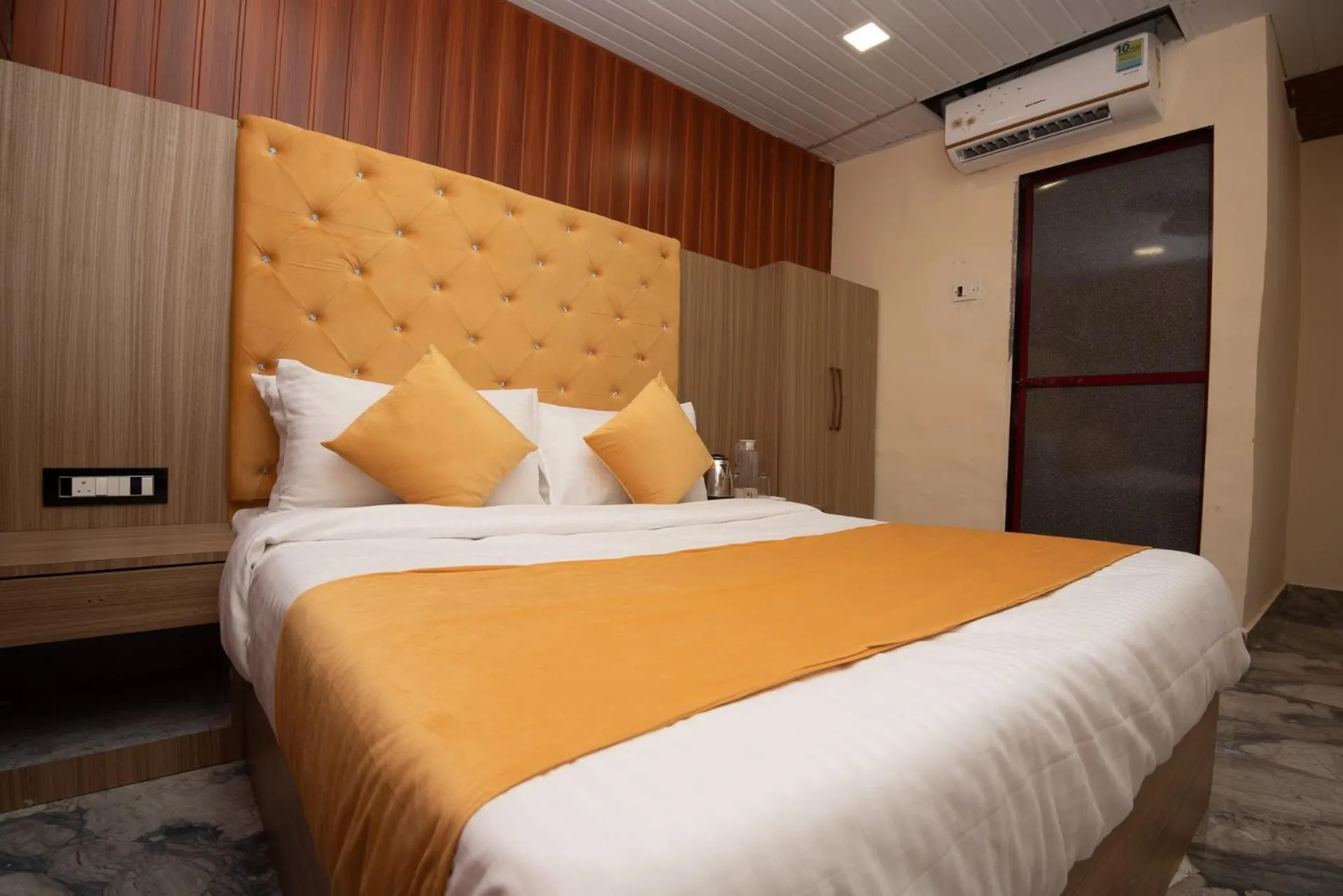 Bed in Hotel Priceless Suite-Nesco Exhibition Goregaon