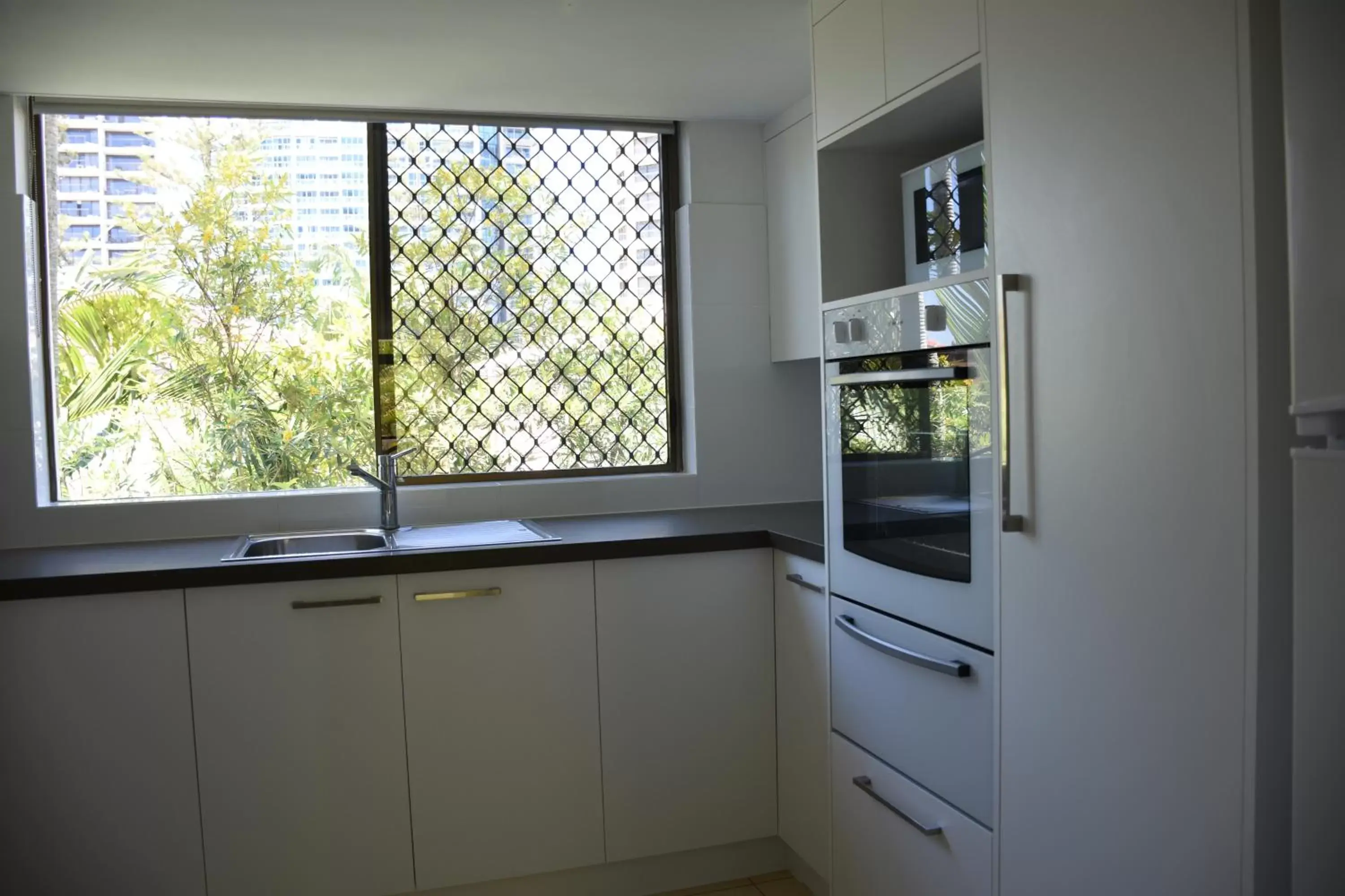 Kitchen/Kitchenette in Copacabana Apartments