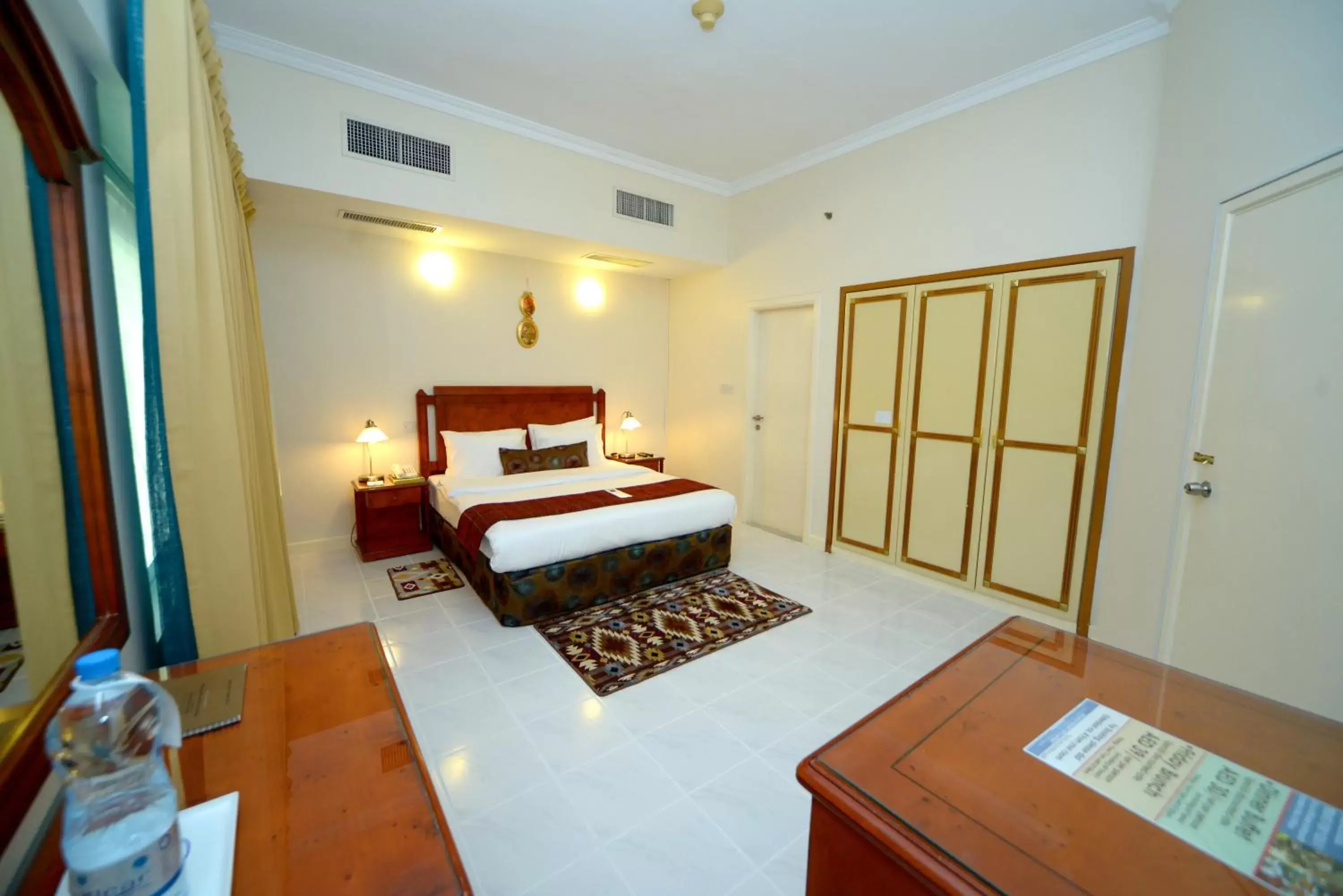 Photo of the whole room, Bed in Nejoum Al Emarat