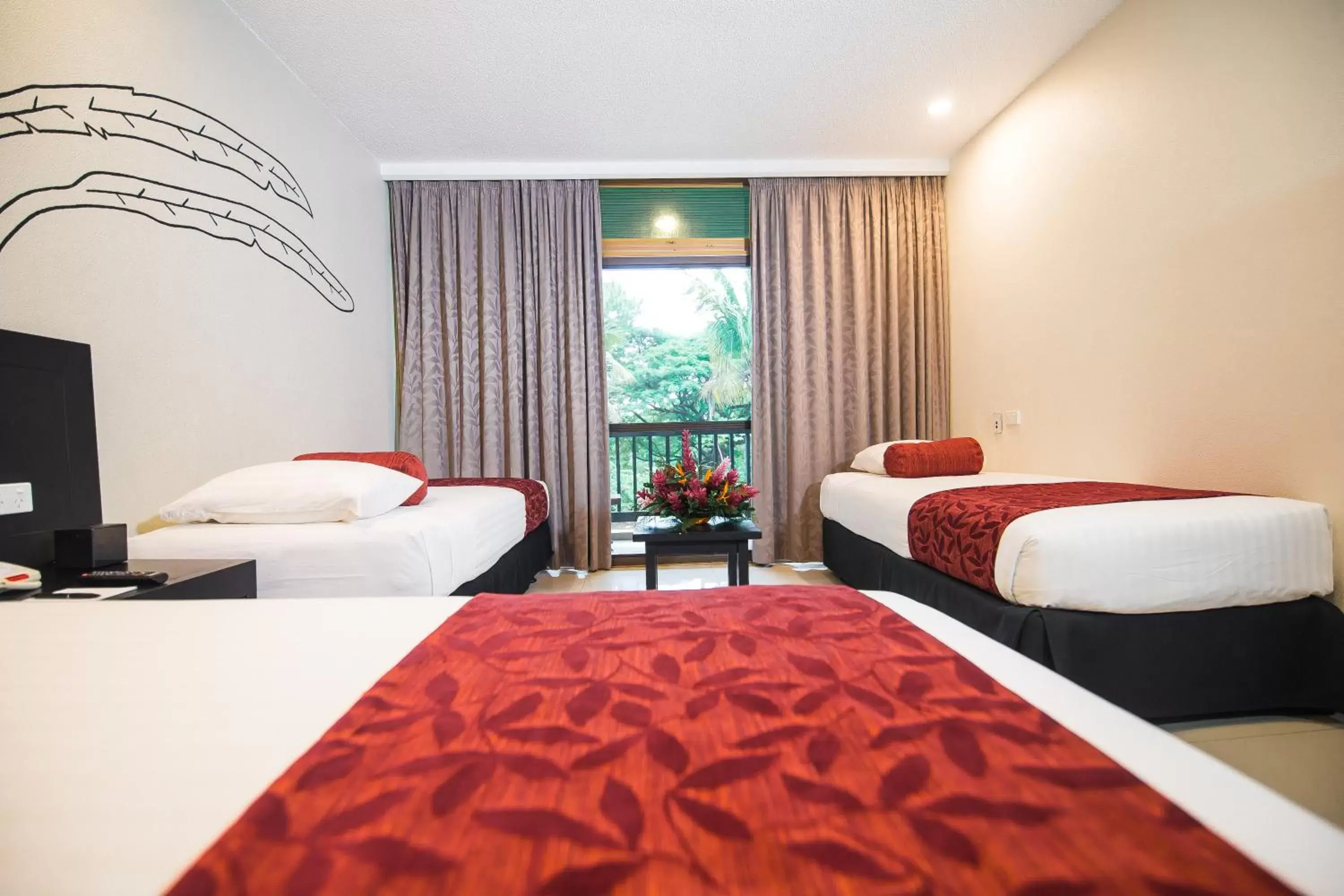 Bed in Tanoa International Hotel