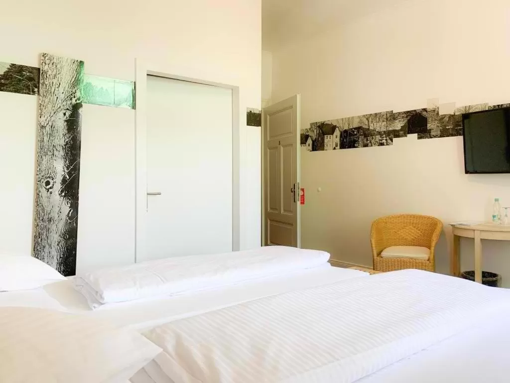 Bed in 2T Hotel artgenossen