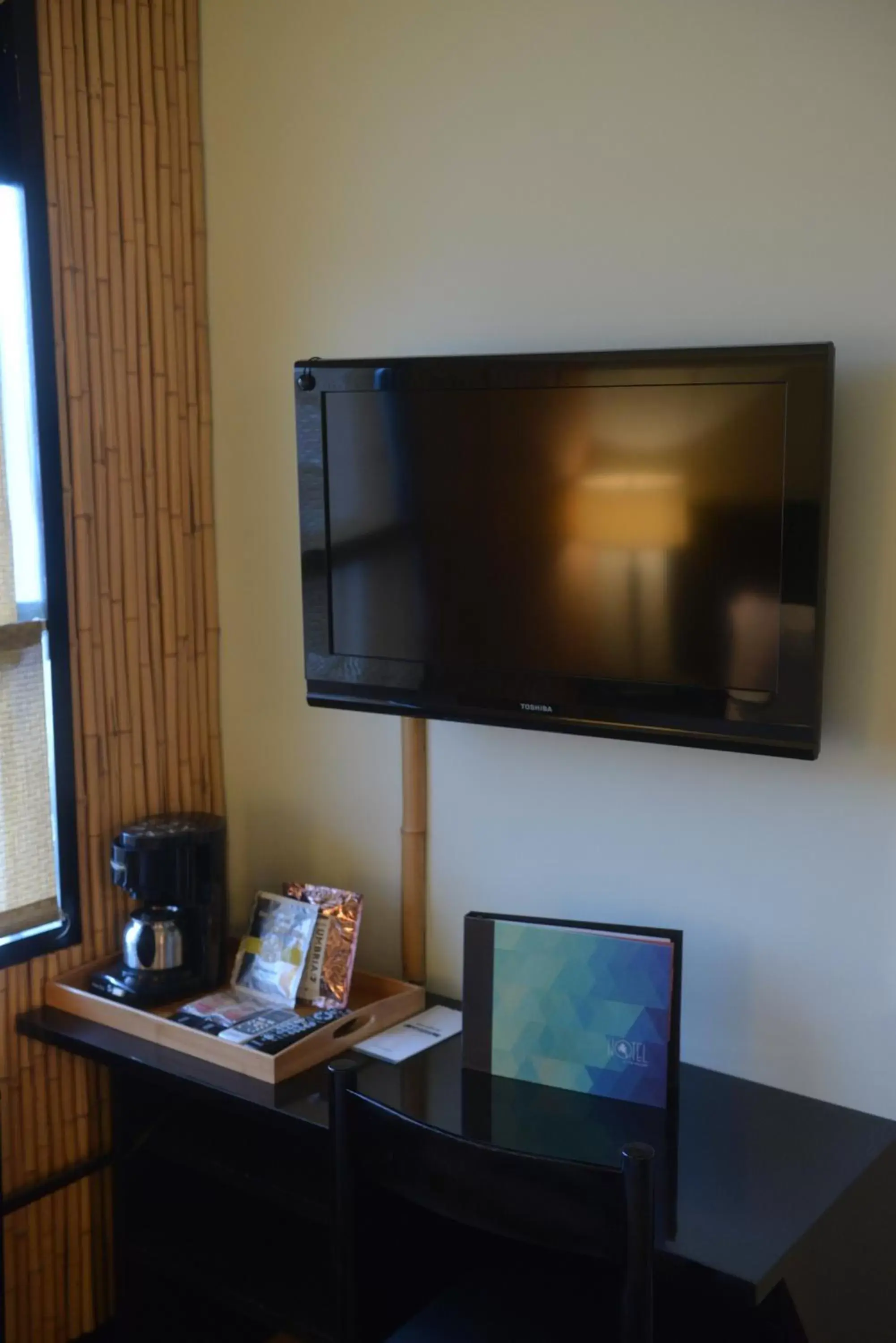 TV and multimedia, TV/Entertainment Center in Hotel at the Waldorf